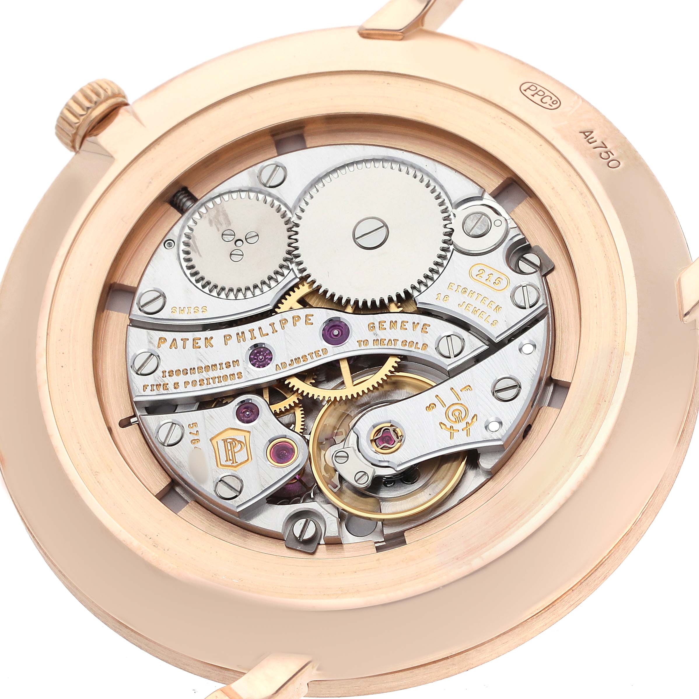 The image shows the back view of the Patek Philippe Calatrava 5116R Men's Rose Gold White Dial, highlighting its intricate movement and engravings.