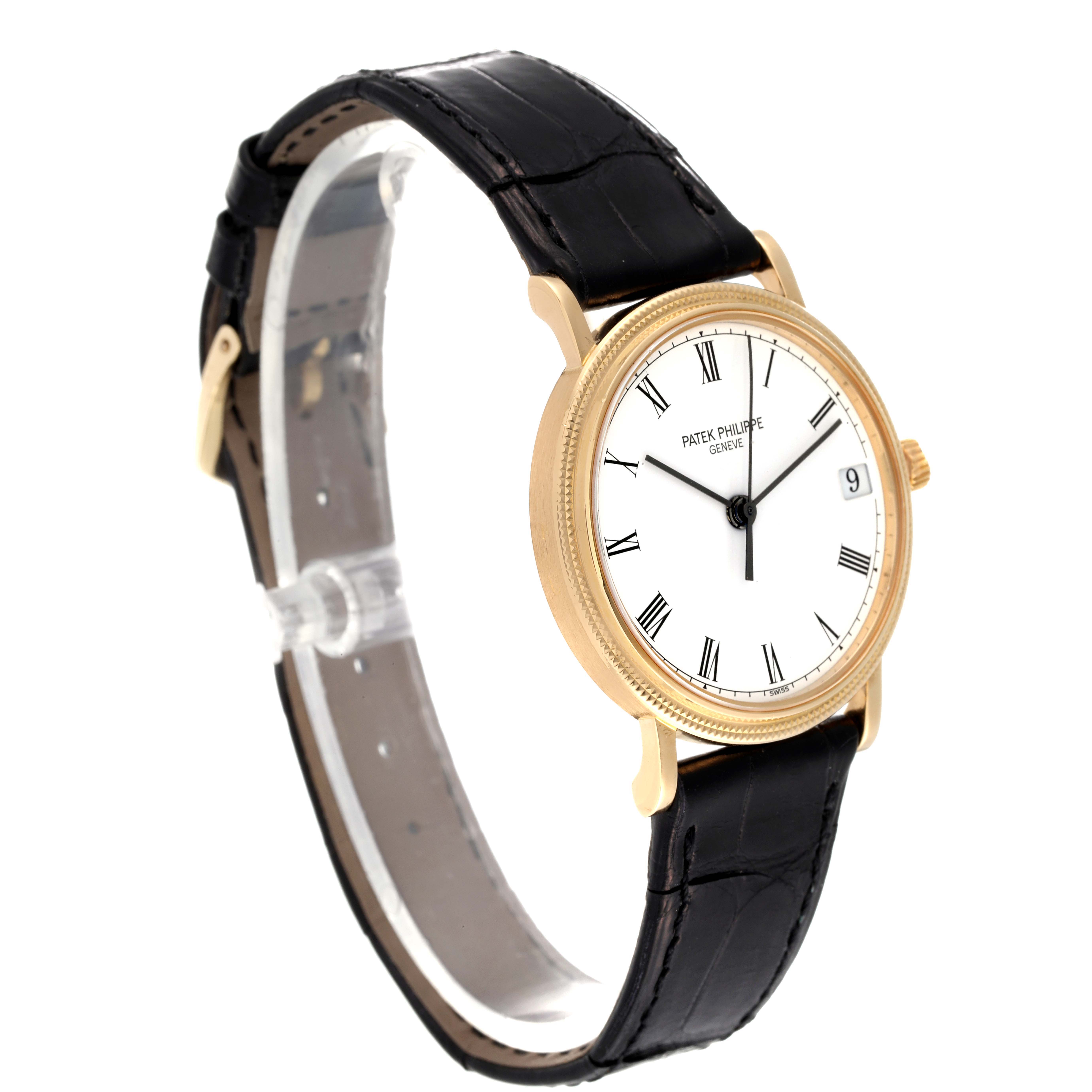 This Patek Philippe Calatrava 3802/200 Men's Yellow Gold White Dial 3802/200 Men's Yellow Gold White Dial watch is shown at a three-quarter angle, highlighting the face, case, and leather strap.