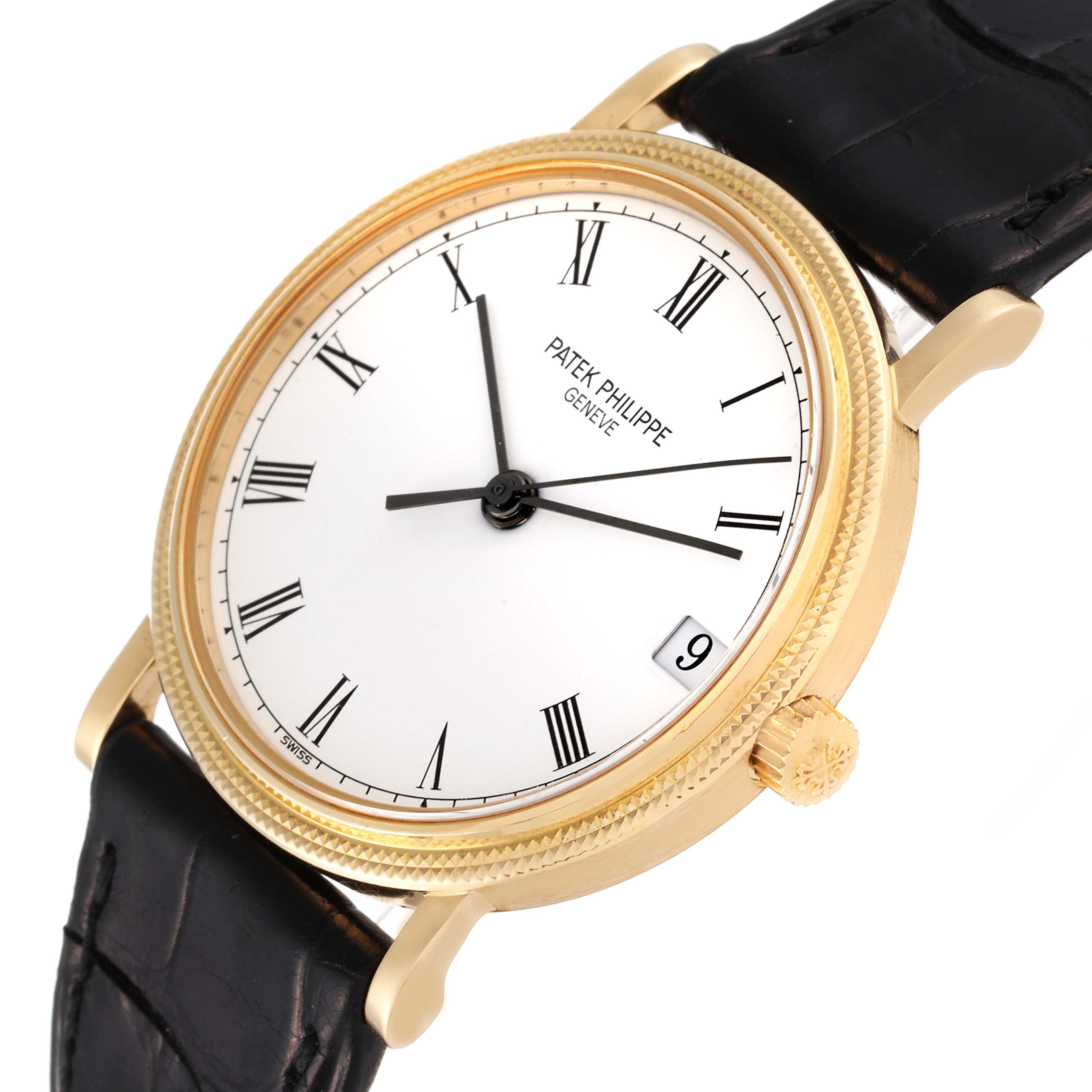 The image depicts a Patek Philippe Calatrava 3802/200 Men's Yellow Gold White Dial 3802/200 Men's Yellow Gold White Dial watch at a slight angle, showcasing the dial, crown, and part of the leather strap.