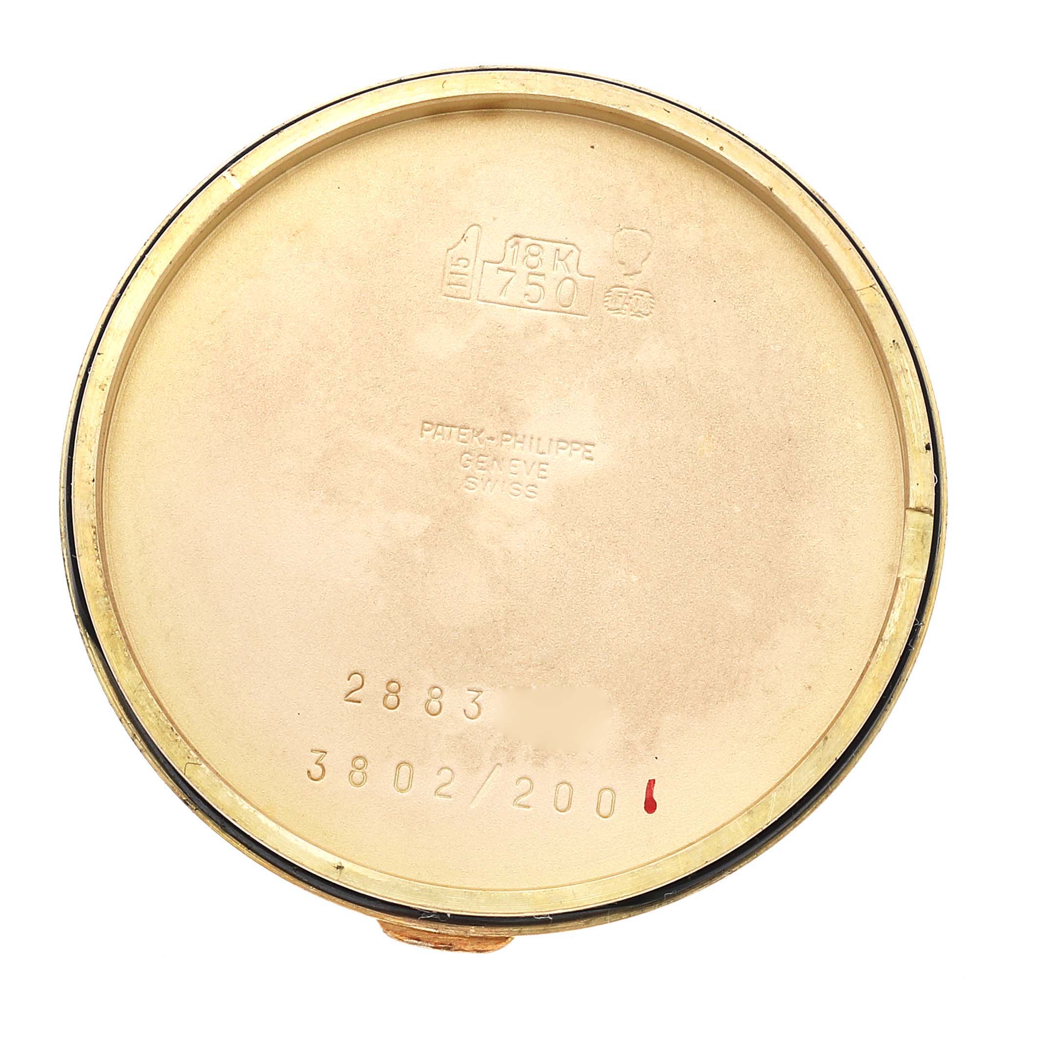 This is an image of the case back interior of a Patek Philippe Calatrava 3802/200 Men's Yellow Gold White Dial 3802/200 Men's Yellow Gold White Dial watch, showing its engravings and hallmarks.
