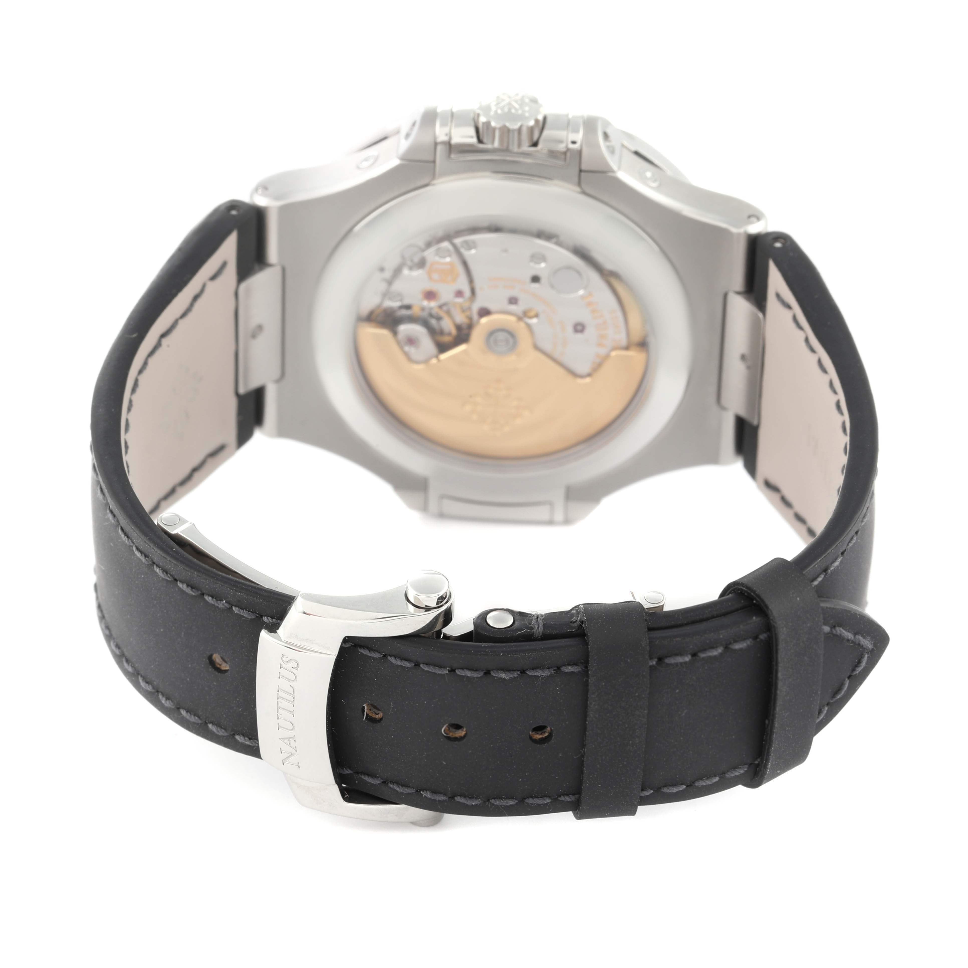 This image shows the back view of a Patek Philippe Nautilus 5726A-001 Men
s Stainless Steel Black Dial 5726A-001 Men
s Stainless Steel Black Dial watch displaying its movement and leather strap.