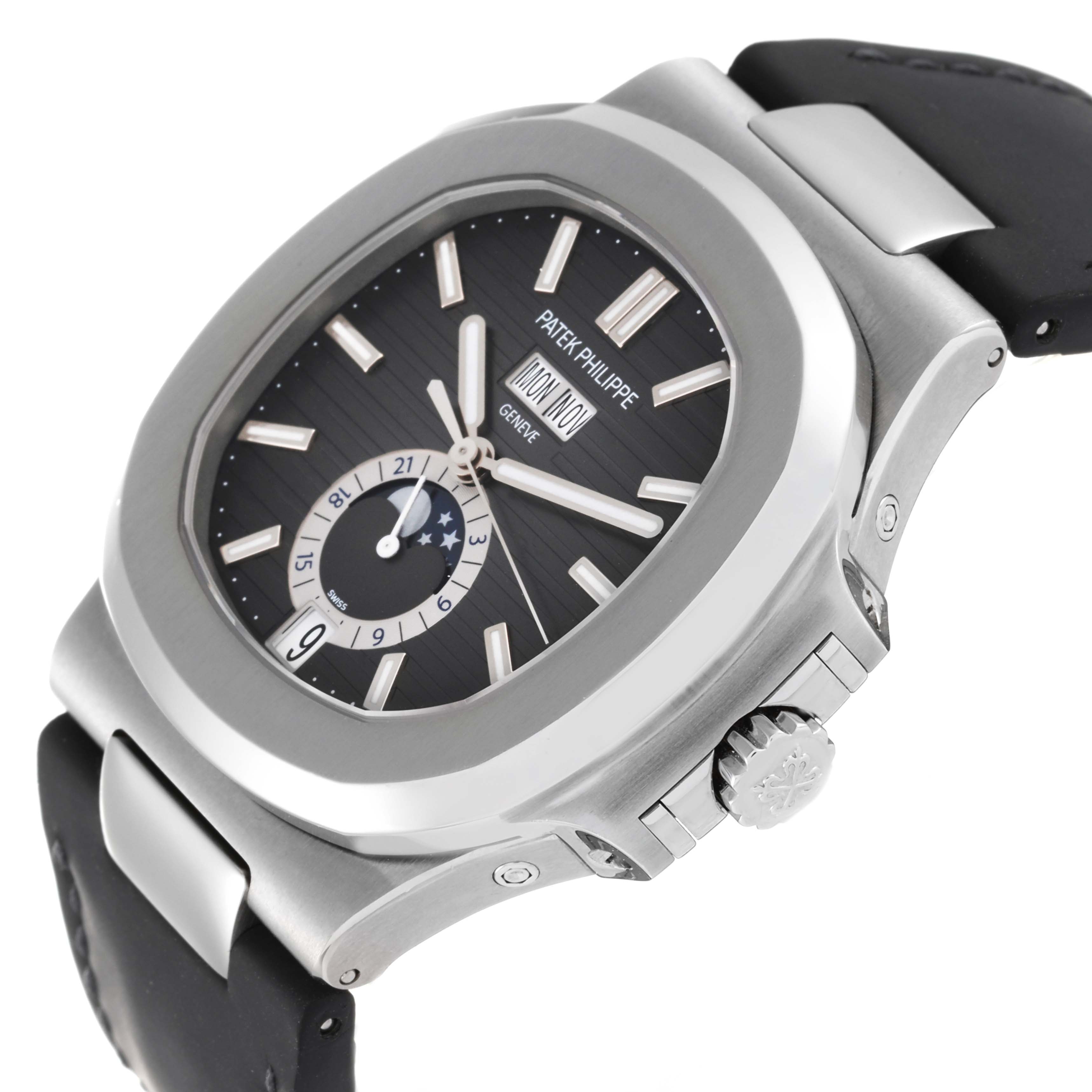 The image shows a close-up angle of the face and side case of the Patek Philippe Nautilus 5726A-001 Men
s Stainless Steel Black Dial 5726A-001 Men
s Stainless Steel Black Dial watch, highlighting the crown and dial features.