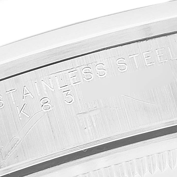 This is a close-up of the case back of a Rolex Air-King 14000 Men's Stainless Steel Blue Dial 14000 Men's Stainless Steel Blue Dial watch, showing the engraved stainless steel information.