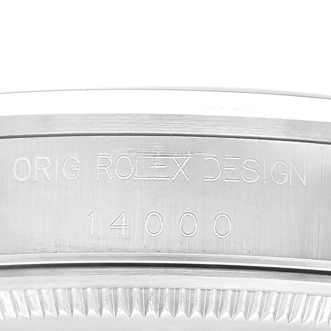 The image shows a close-up of the engraved side of the Rolex Air-King 14000 Men's Stainless Steel Blue Dial 14000 Men's Stainless Steel Blue Dial, displaying "ORIG ROLEX DESIGN 14000".