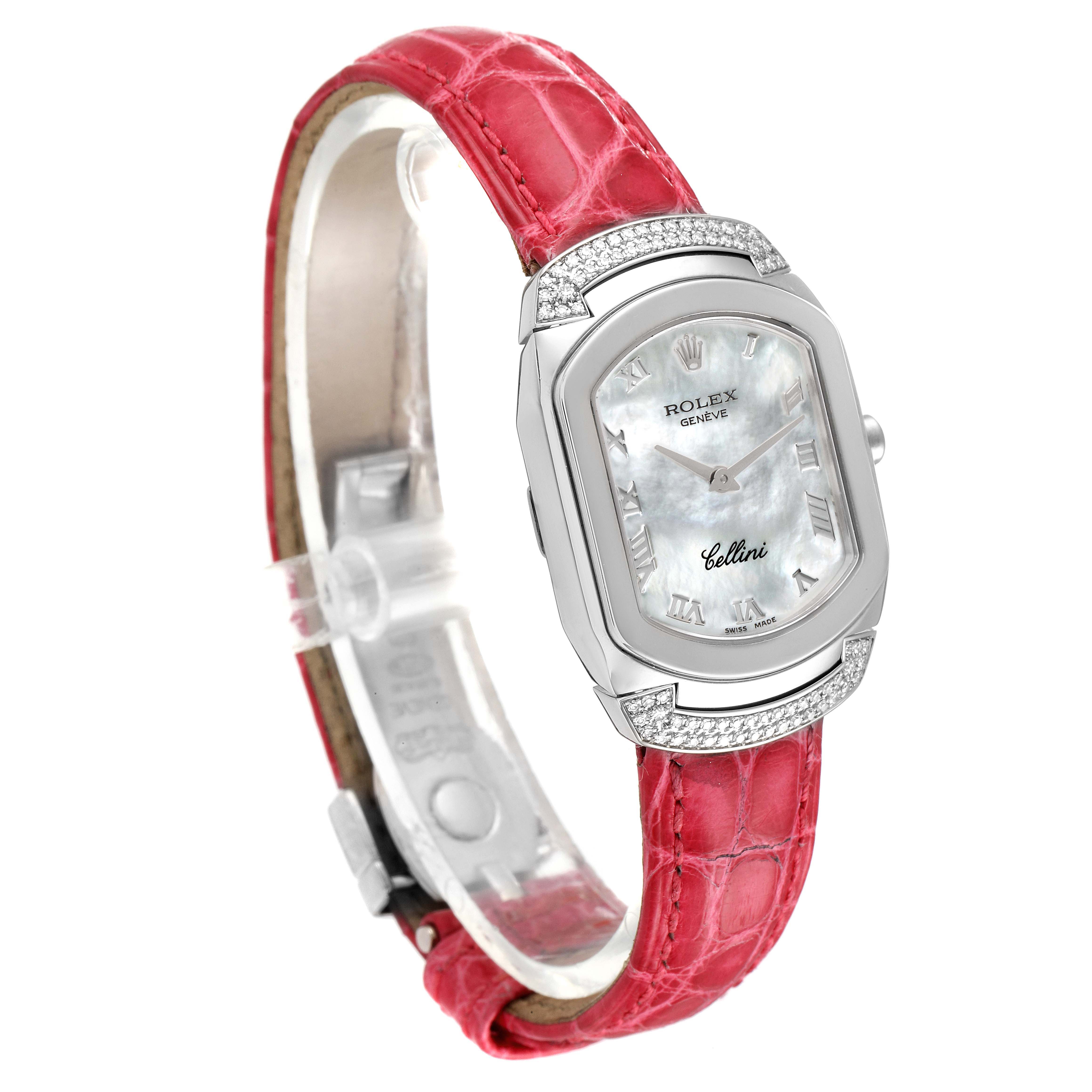 The Rolex Cellini 6692 Women's White Gold Mother of Pearl Dial 6692 Women's White Gold Mother of Pearl Dial watch is shown at a slight angle featuring its mother-of-pearl dial, diamond accents, and red leather strap.