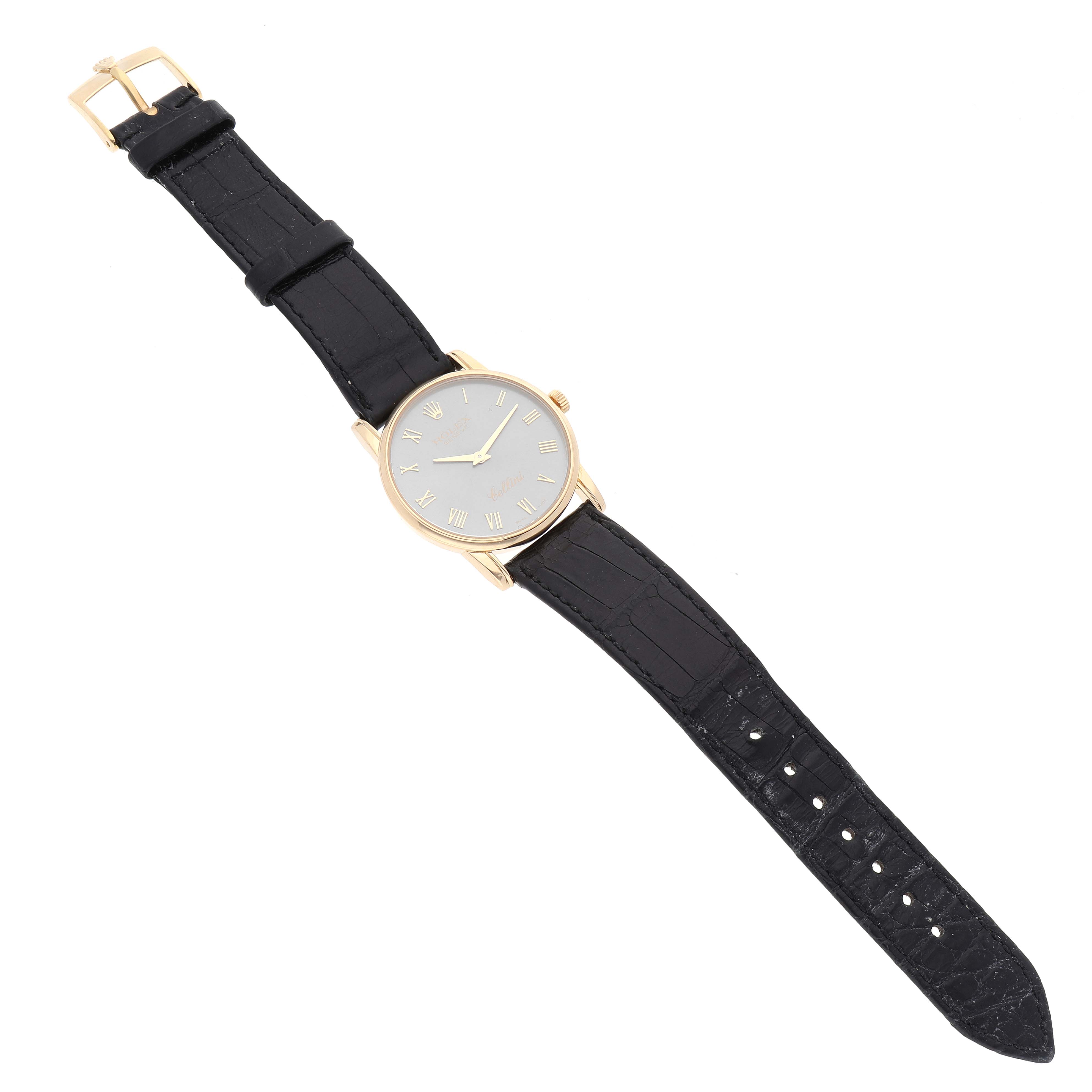 The Rolex Cellini 5116 Men's Yellow Gold Grey Dial 5116 Men's Yellow Gold Grey Dial watch is shown from a top-down angle, displaying its face, black leather strap, and gold buckle.