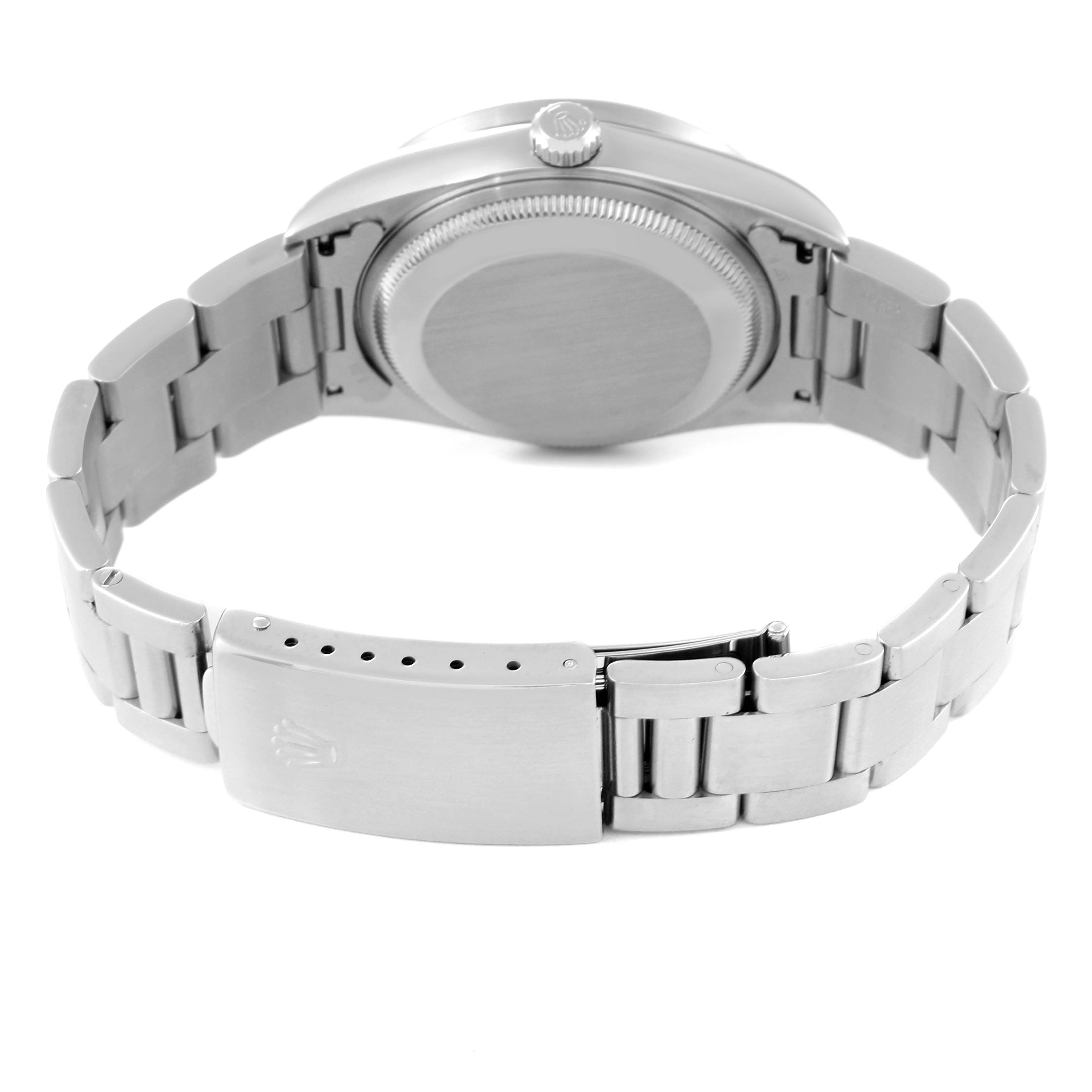 The image shows the back angle of a Rolex Date 15210 Men's Stainless Steel Blue Dial 15210 Men's Stainless Steel Blue Dial model watch, focusing on the case back and metal bracelet with a clasp.