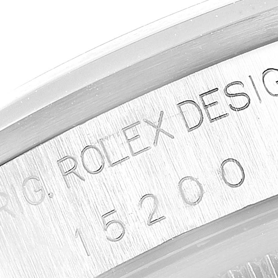 This image shows a close-up of the Rolex Date 15200 Men's Stainless Steel Blue Dial 15200 Men's Stainless Steel Blue Dial model's case with the engraved design and reference number.