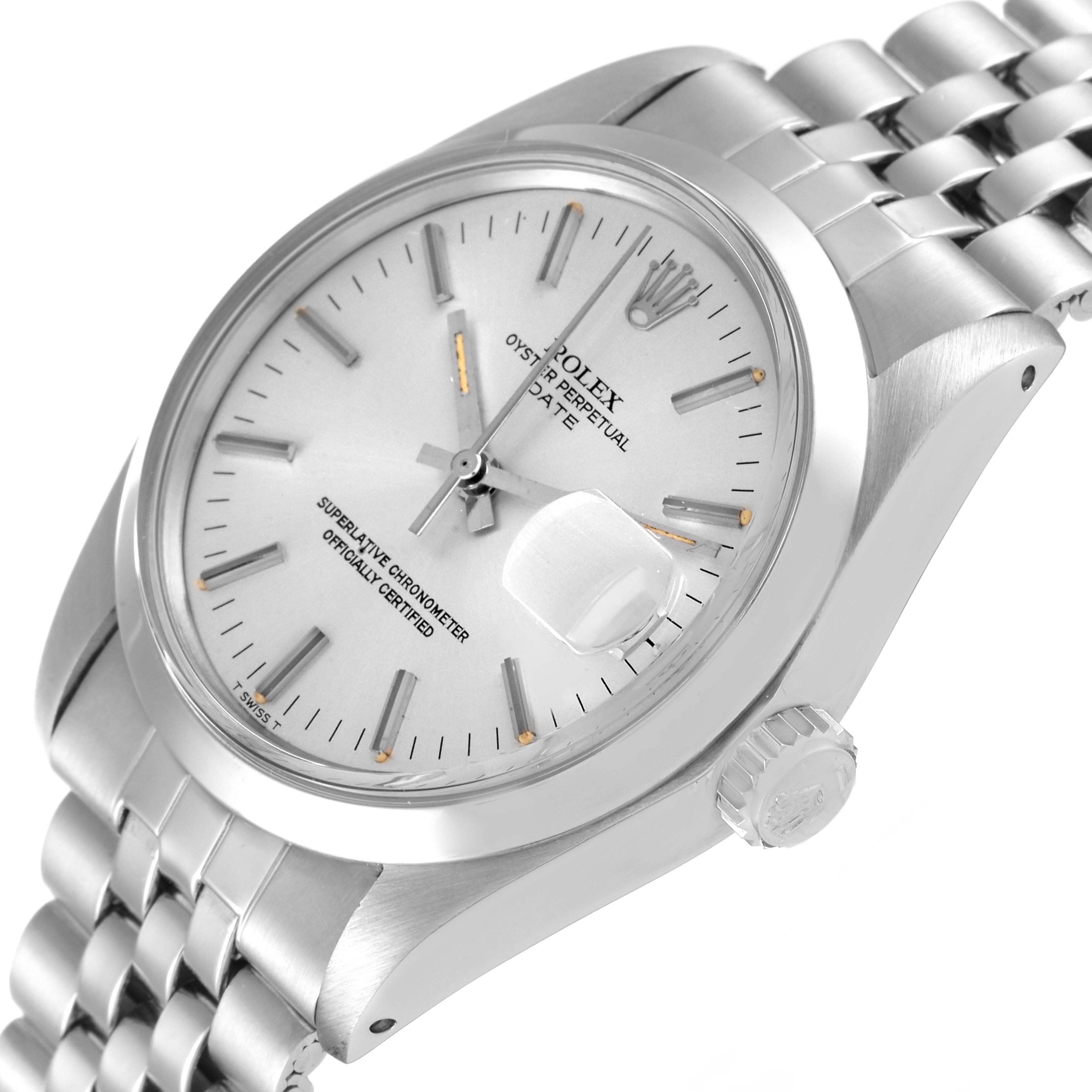 The image shows a side angle view of the Rolex Date 1500 Men
s Stainless Steel Silver Dial 1500 Men
s Stainless Steel Silver Dial model, highlighting the face, clasp, and crown.