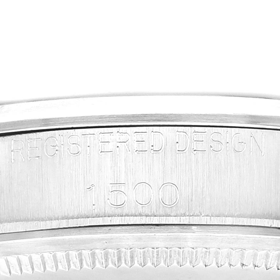 This close-up image shows the engraved model number "1500" on the case of a Rolex Date 1500 Men
s Stainless Steel Silver Dial 1500 Men
s Stainless Steel Silver Dial watch.
