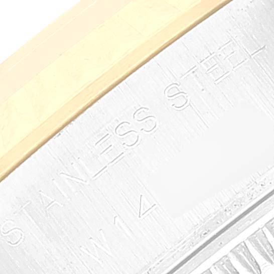 The image shows a close-up of the side of the Rolex Datejust 69173 Women's Steel and Gold (two tone) Silver Dial 69173 Women's Steel and Gold (two tone) Silver Dial watch case made of stainless steel and gold.