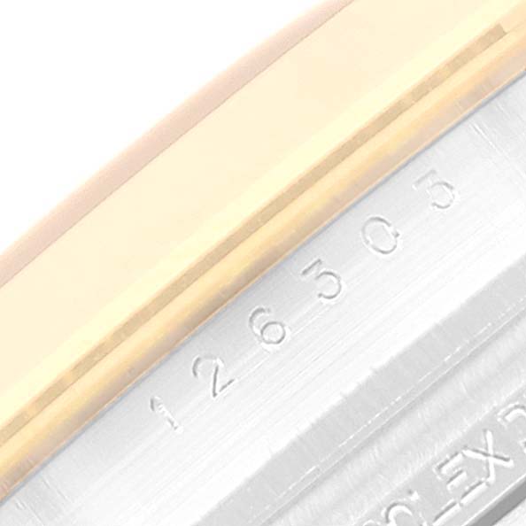 The image shows a close-up of the serial engraving on the case side of a Rolex Datejust 41 126303 Men's Steel and Gold (two tone) Black Dial 126303 Men's Steel and Gold (two tone) Black Dial model.