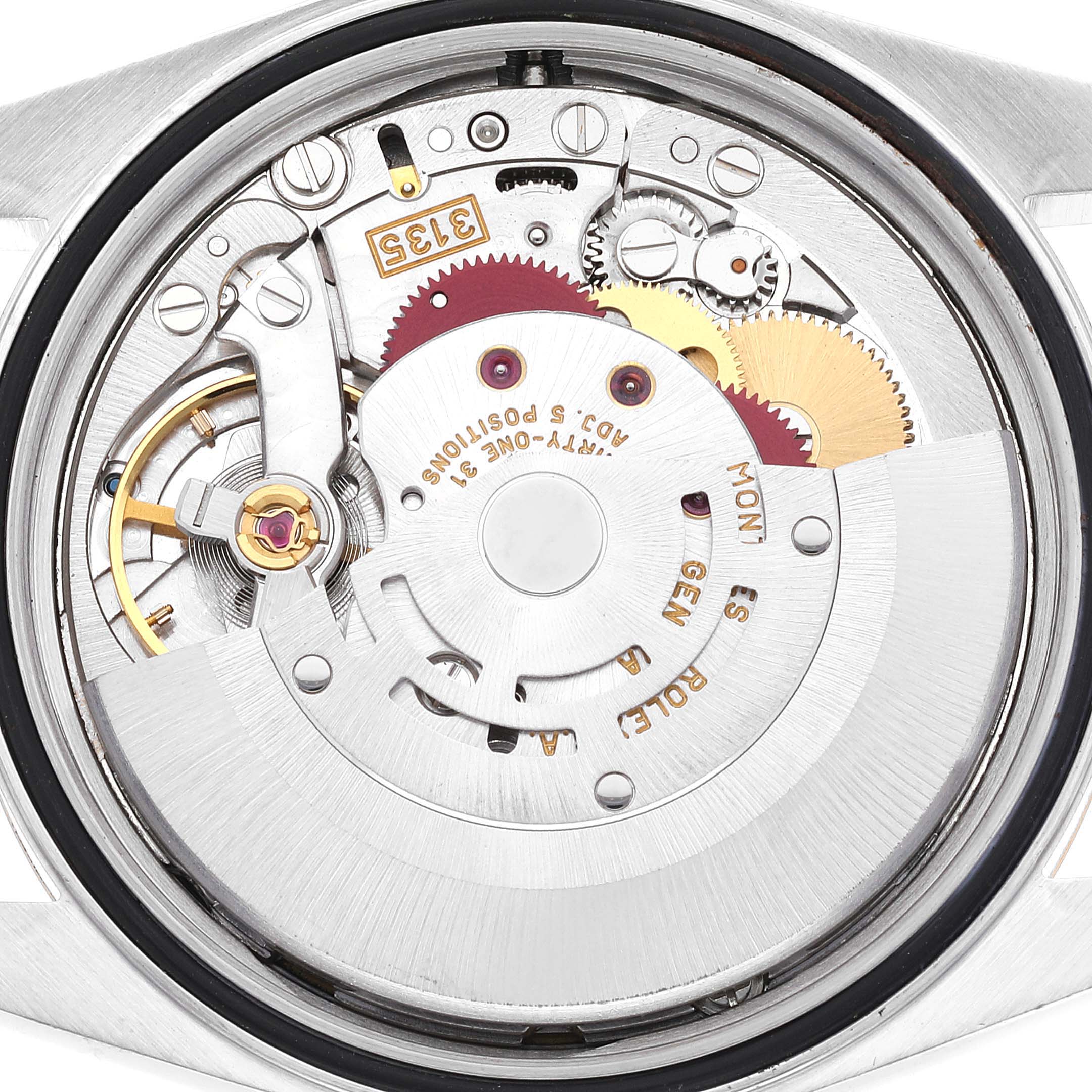 This image shows a close-up of the movement and inner mechanism of a Rolex Datejust 16233 Men's Steel and Gold (two tone) Blue Dial 16233 Men's Steel and Gold (two tone) Blue Dial watch from the back.