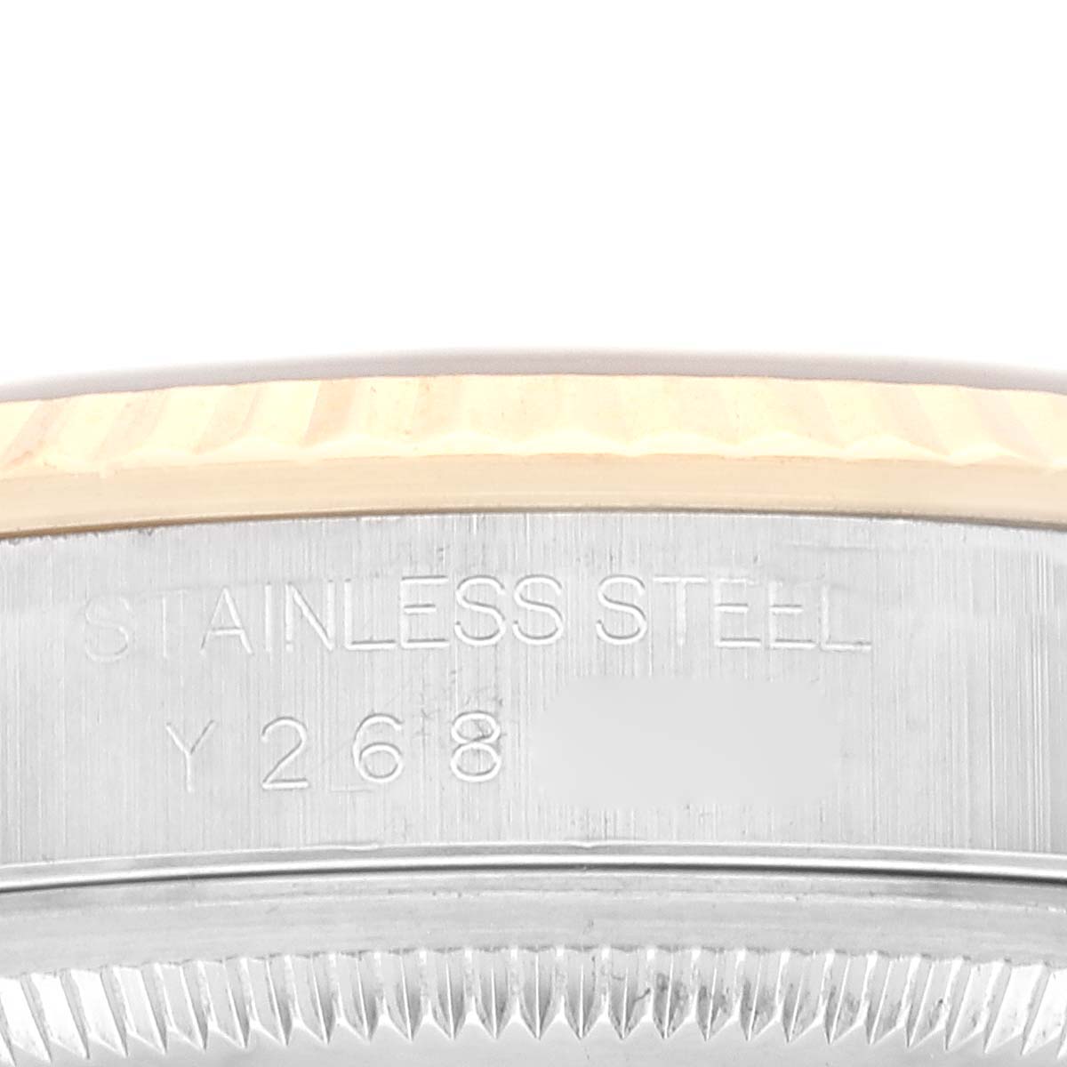 This image shows a close-up of the Rolex Datejust 16233 Men's Steel and Gold (two tone) Blue Dial 16233 Men's Steel and Gold (two tone) Blue Dial model watch, focusing on the stainless steel case and part of the bezel.