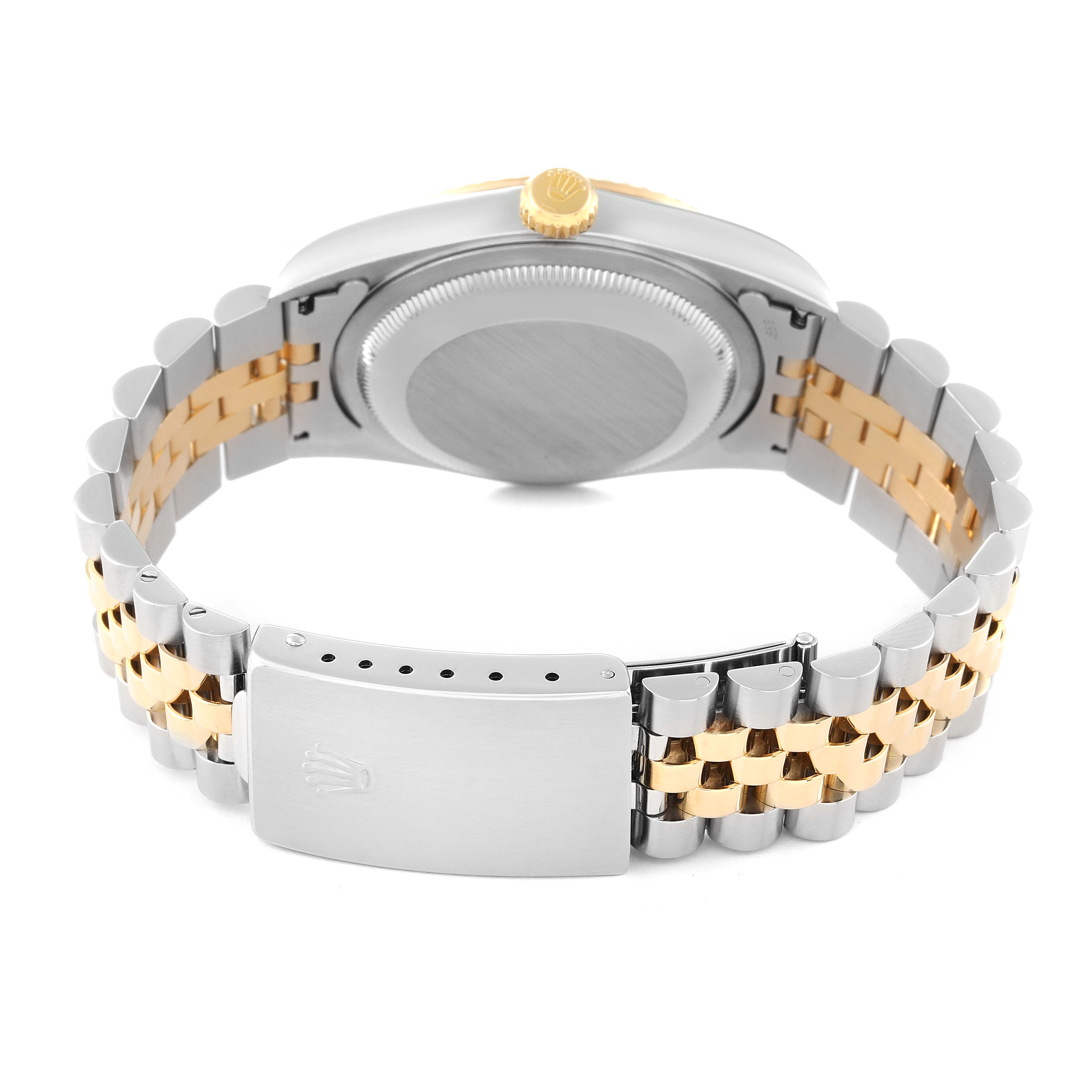 This image shows the back view of a Rolex Datejust 16233 Men's Steel and Gold (two tone) Blue Dial 16233 Men's Steel and Gold (two tone) Blue Dial watch, highlighting its bi-metal bracelet and closed clasp.