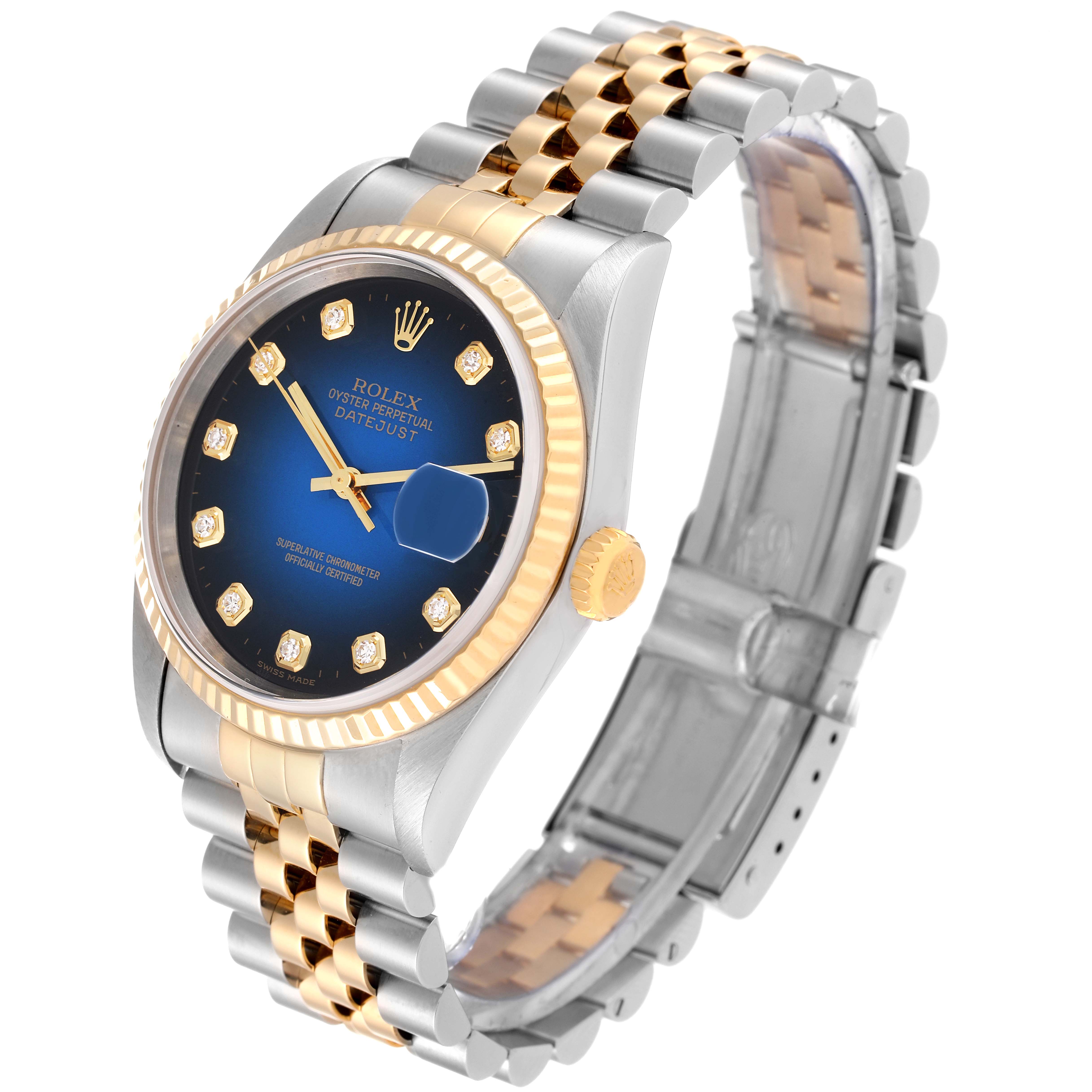 The Rolex Datejust 16233 Men's Steel and Gold (two tone) Blue Dial 16233 Men's Steel and Gold (two tone) Blue Dial watch is shown at an angle displaying its face, bezel, crown, and two-toned bracelet.