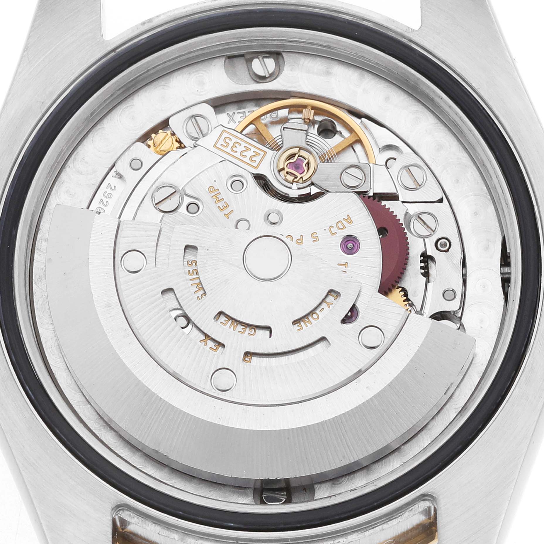 This image shows a close-up of the movement and internal mechanism of a Rolex Mid-Size 178343 Women's Steel and Gold (two tone) Silver Dial watch from the back.