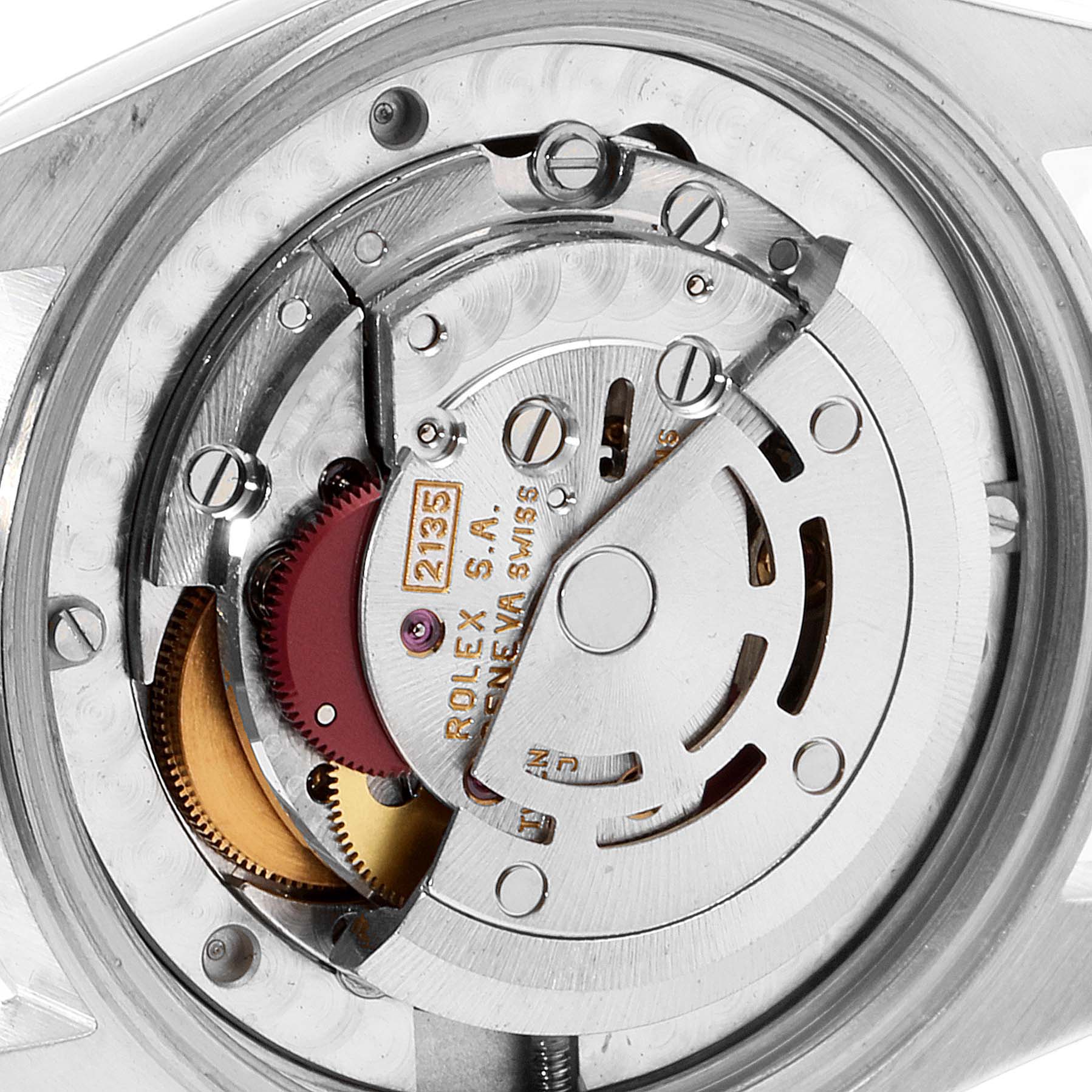 This is a close-up view of the movement mechanism inside a Mid-Size Rolex watch.