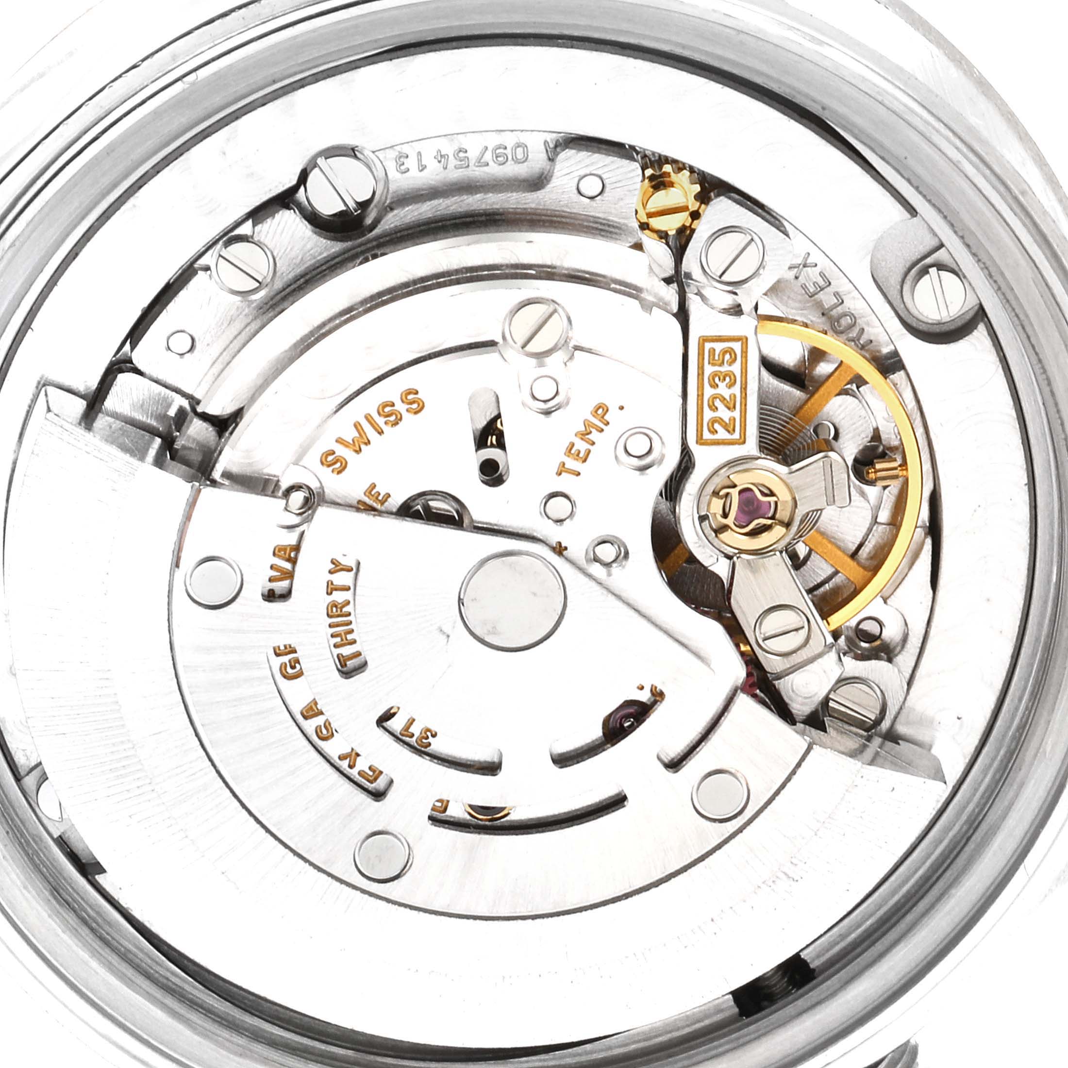 This close-up image shows the intricate internal movement and parts of a Rolex Mid-Size 78274 Women
s Stainless Steel Blue Dial 78274 Women
s Stainless Steel Blue Dial model watch.