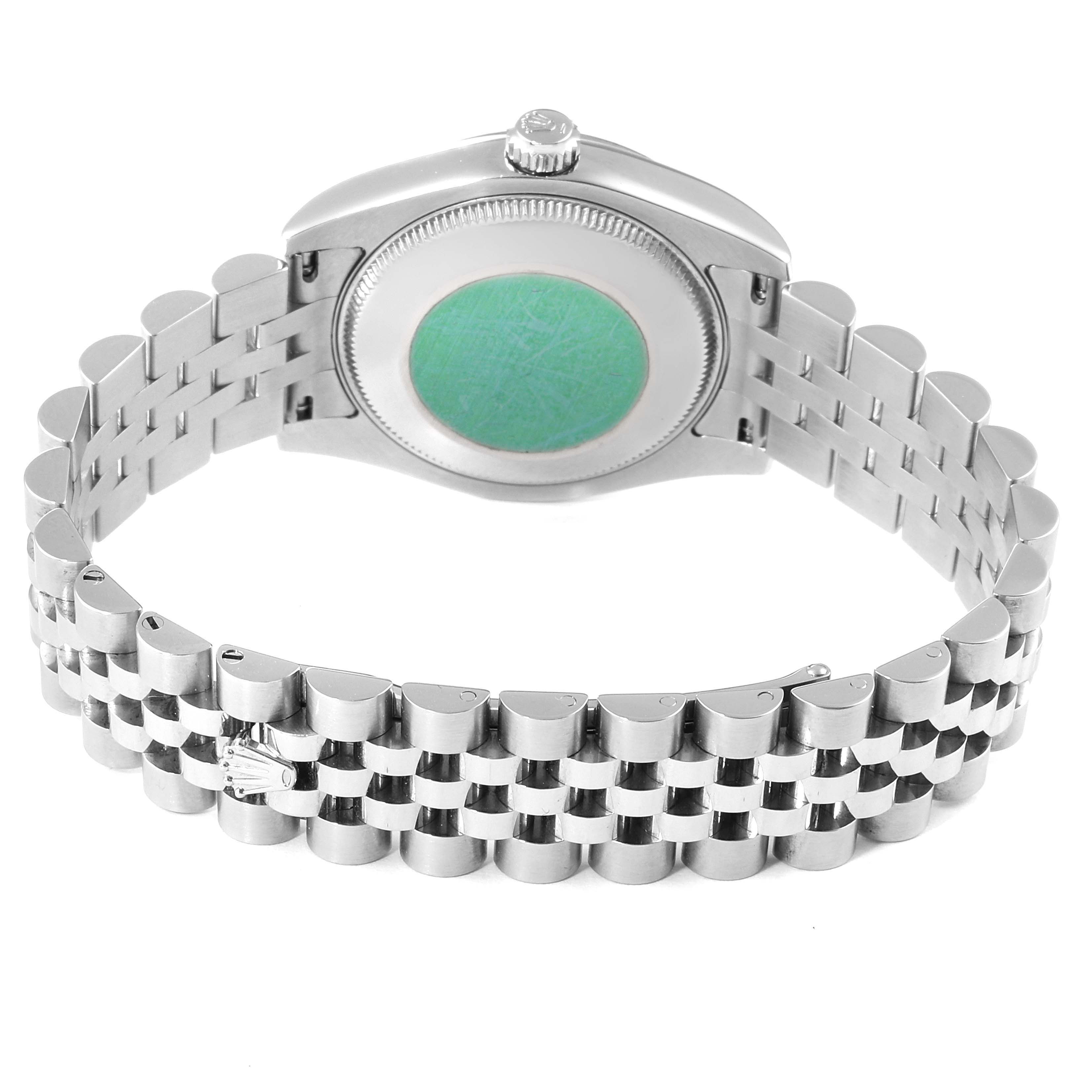 This image shows the underside of a Rolex Mid-Size 178274 Women
s Stainless Steel Mother of Pearl Dial 178274 Women
s Stainless Steel Mother of Pearl Dial watch, highlighting the case back and stainless steel bracelet.