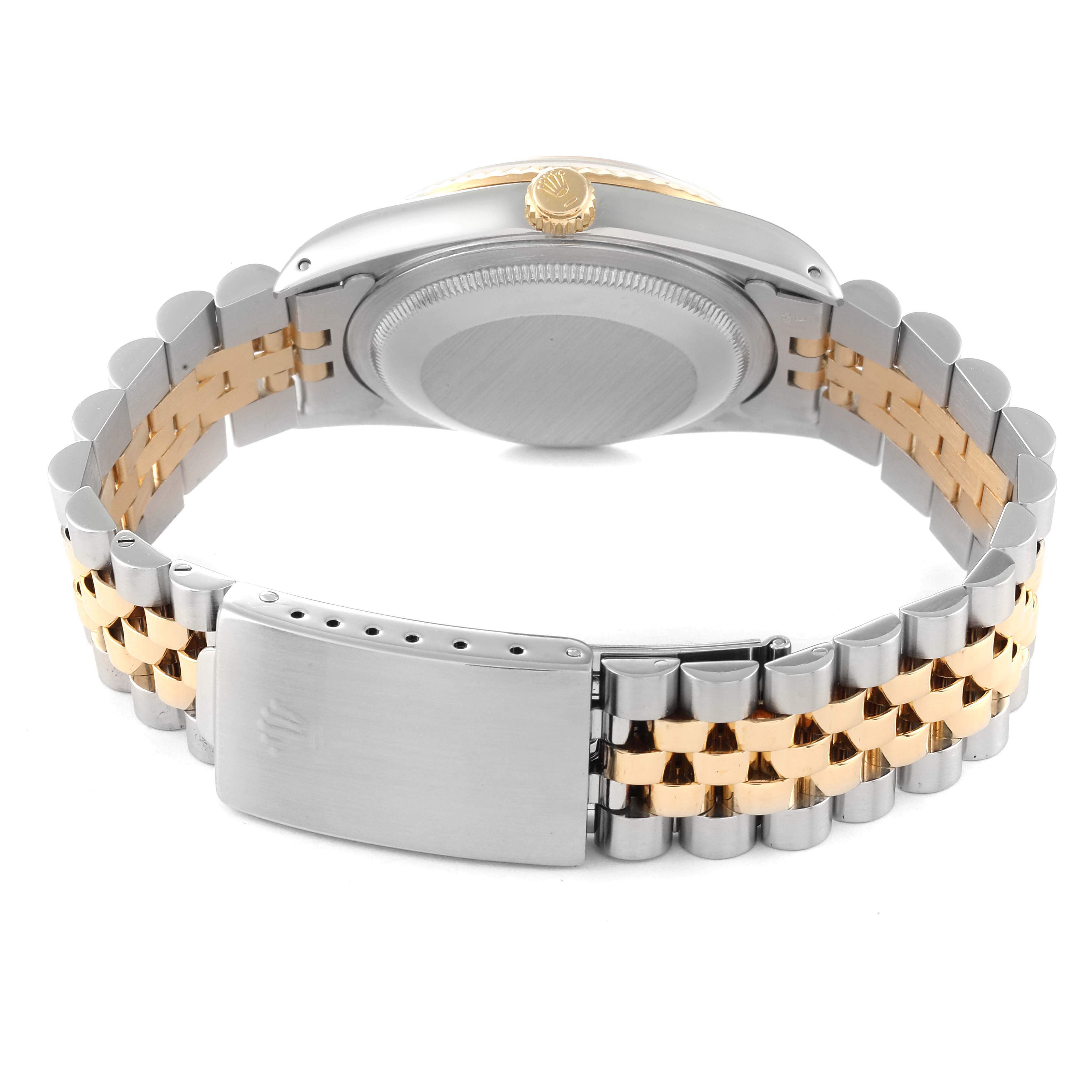 This image shows the back of the Rolex Datejust 16233 Men's Steel and Gold (two tone) Beige Dial 16233 Men's Steel and Gold (two tone) Beige Dial watch, highlighting its two-tone bracelet and clasp.