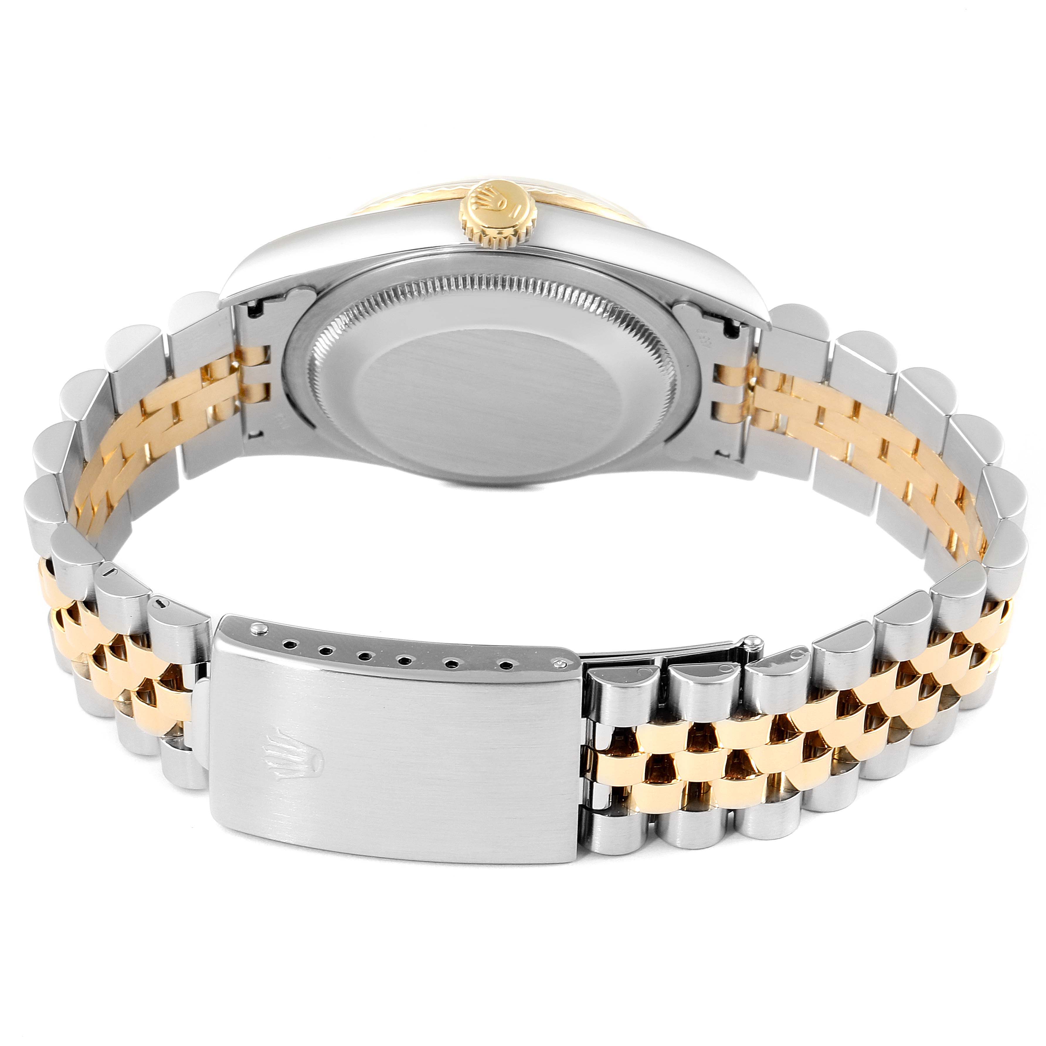 This image shows the back case, crown, and bracelet of a Rolex Datejust 16233 Men's Steel and Gold (two tone) Champagne Dial 16233 Men's Steel and Gold (two tone) Champagne Dial watch from a rear angle.