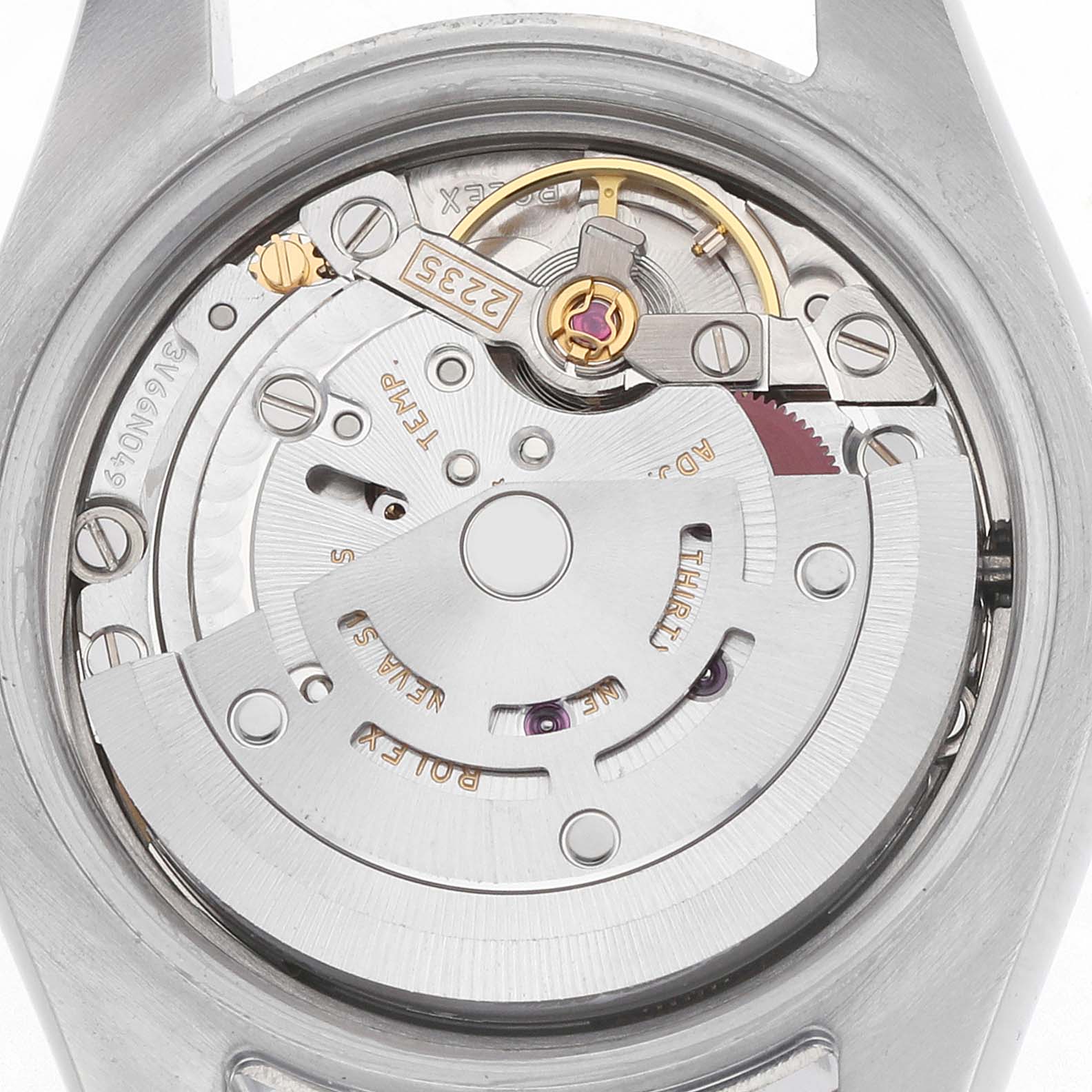 The image shows the movement of a Rolex Datejust 179171 Women's Steel and Gold (two tone) Mother of Pearl Dial, viewed from the back, highlighting its intricate mechanism.