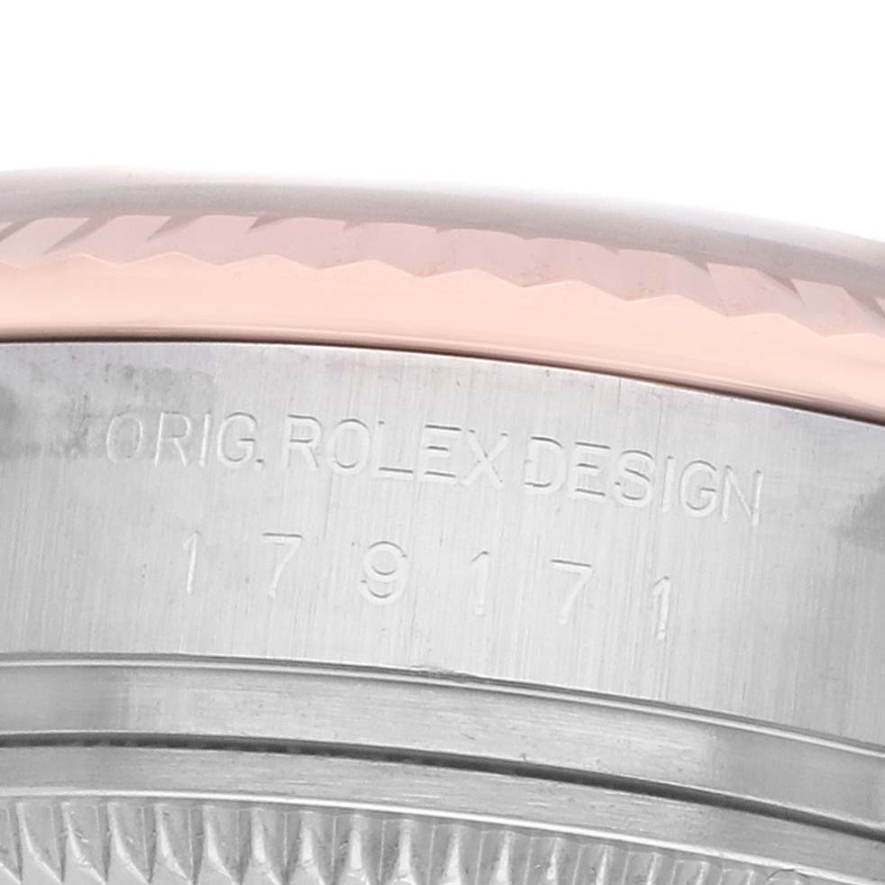 The image shows a close-up of the Rolex Datejust 179171 Women's Steel and Gold (two tone) Mother of Pearl Dial watch's engraved case side with the model number.