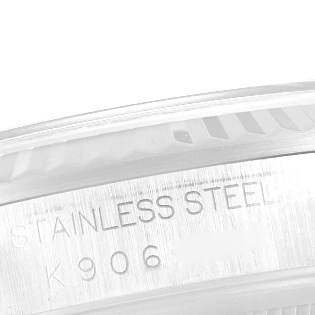This close-up image of a Rolex Datejust 16234 Men's Stainless Steel Silver Dial 16234 Men's Stainless Steel Silver Dial shows the side view of the case with "Stainless Steel" engraved.