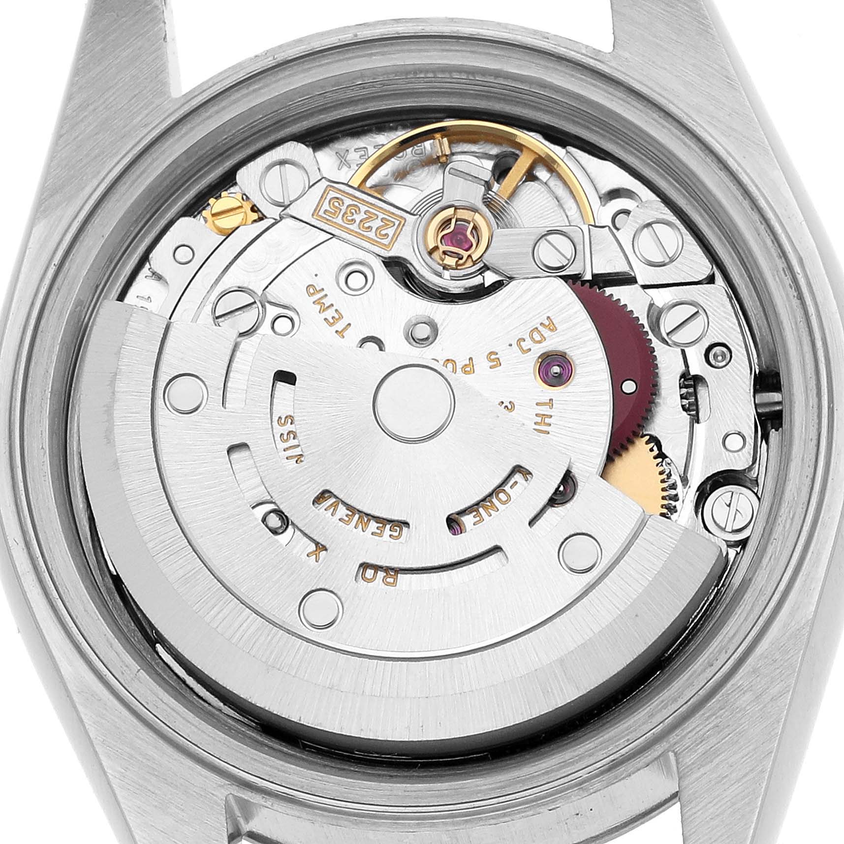 The image shows the movement of a Rolex Datejust 79174 Women's Stainless Steel White Dial watch from a top-down angle, highlighting its intricate mechanical components.