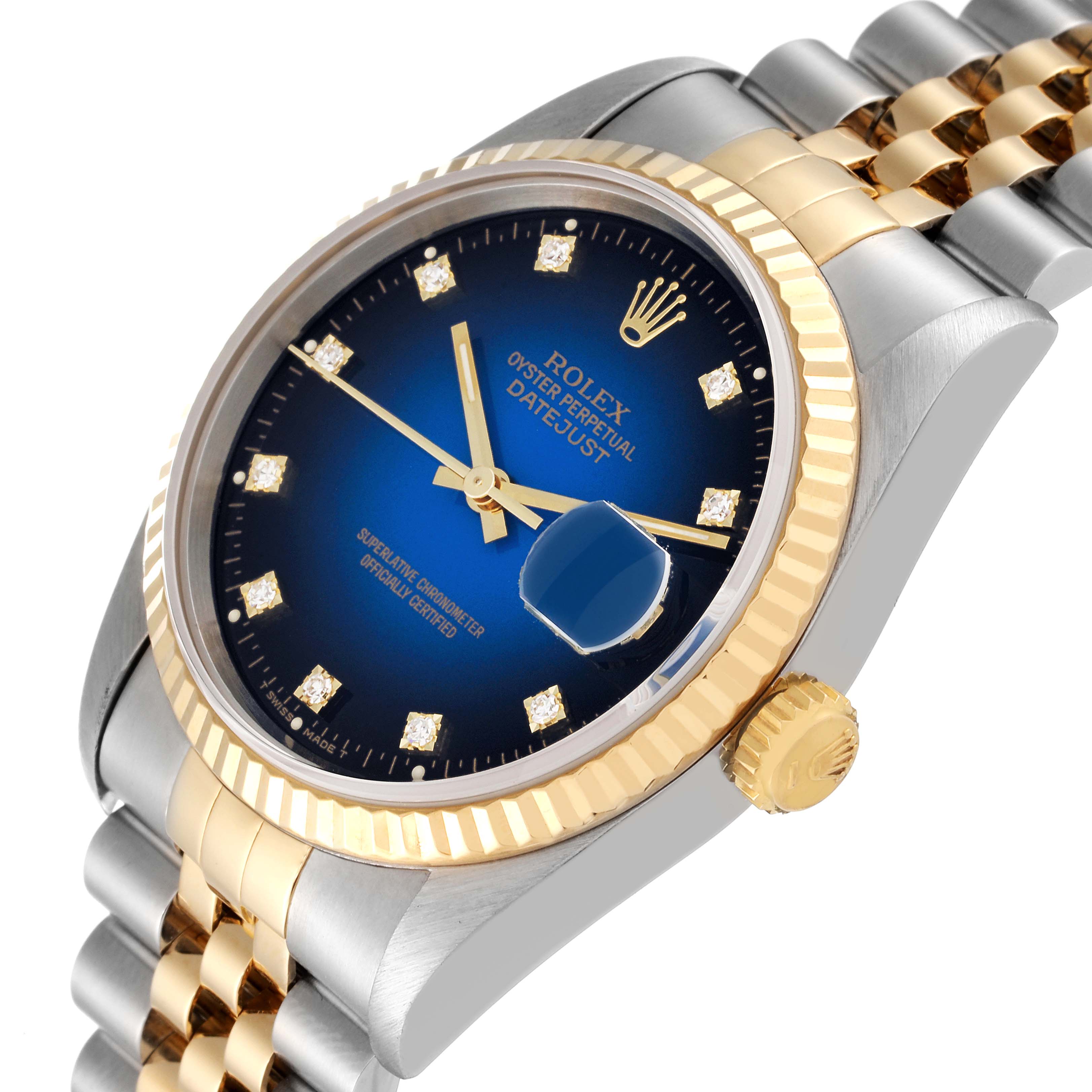 This image shows a side angle of a Rolex Datejust 16233 Men's Steel and Gold (two tone) Blue Dial 16233 Men's Steel and Gold (two tone) Blue Dial watch, highlighting the blue dial, date magnifier, and two-tone bracelet.