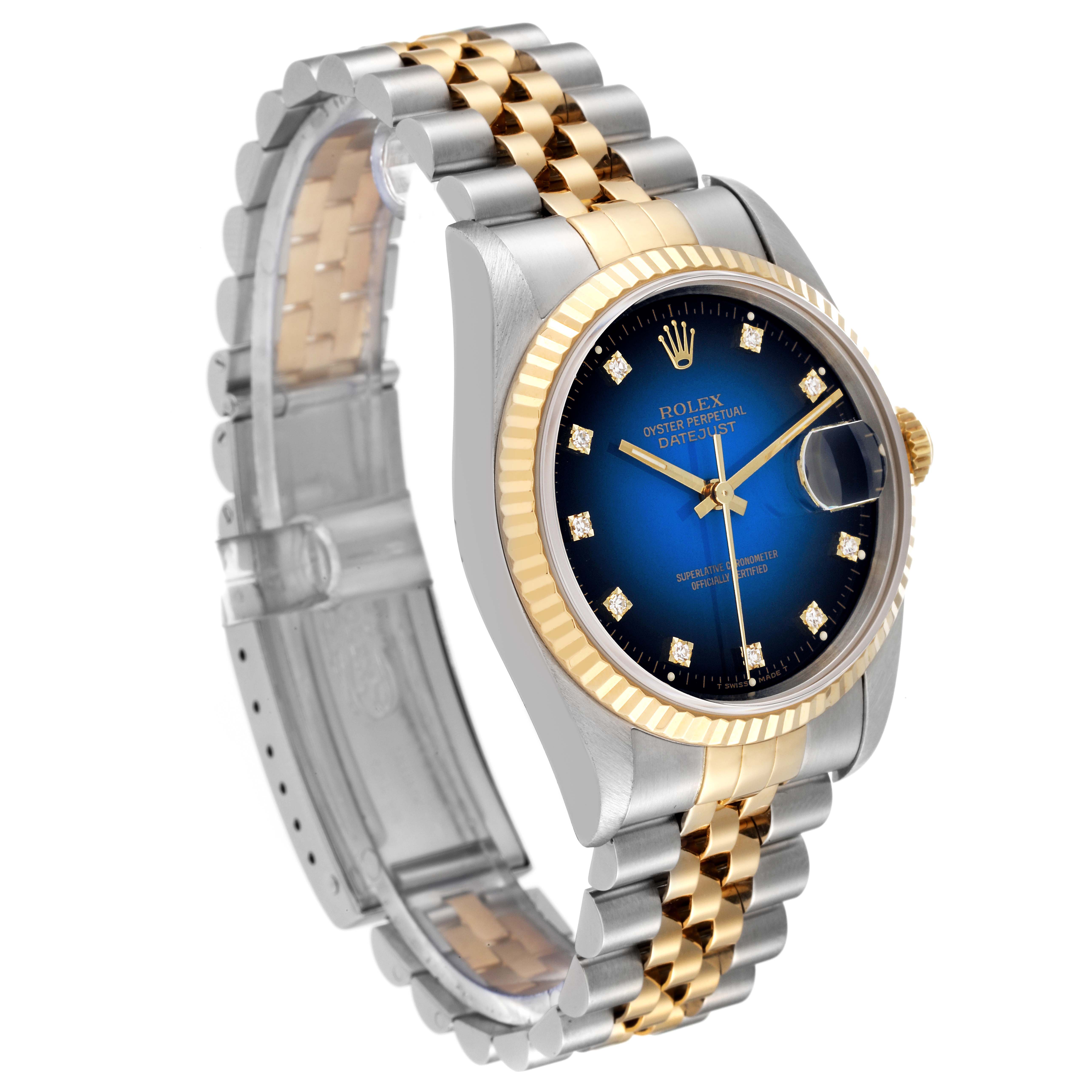 The Rolex Datejust 16233 Men's Steel and Gold (two tone) Blue Dial 16233 Men's Steel and Gold (two tone) Blue Dial watch is shown from a front-right angle, highlighting its two-tone bracelet and blue dial.