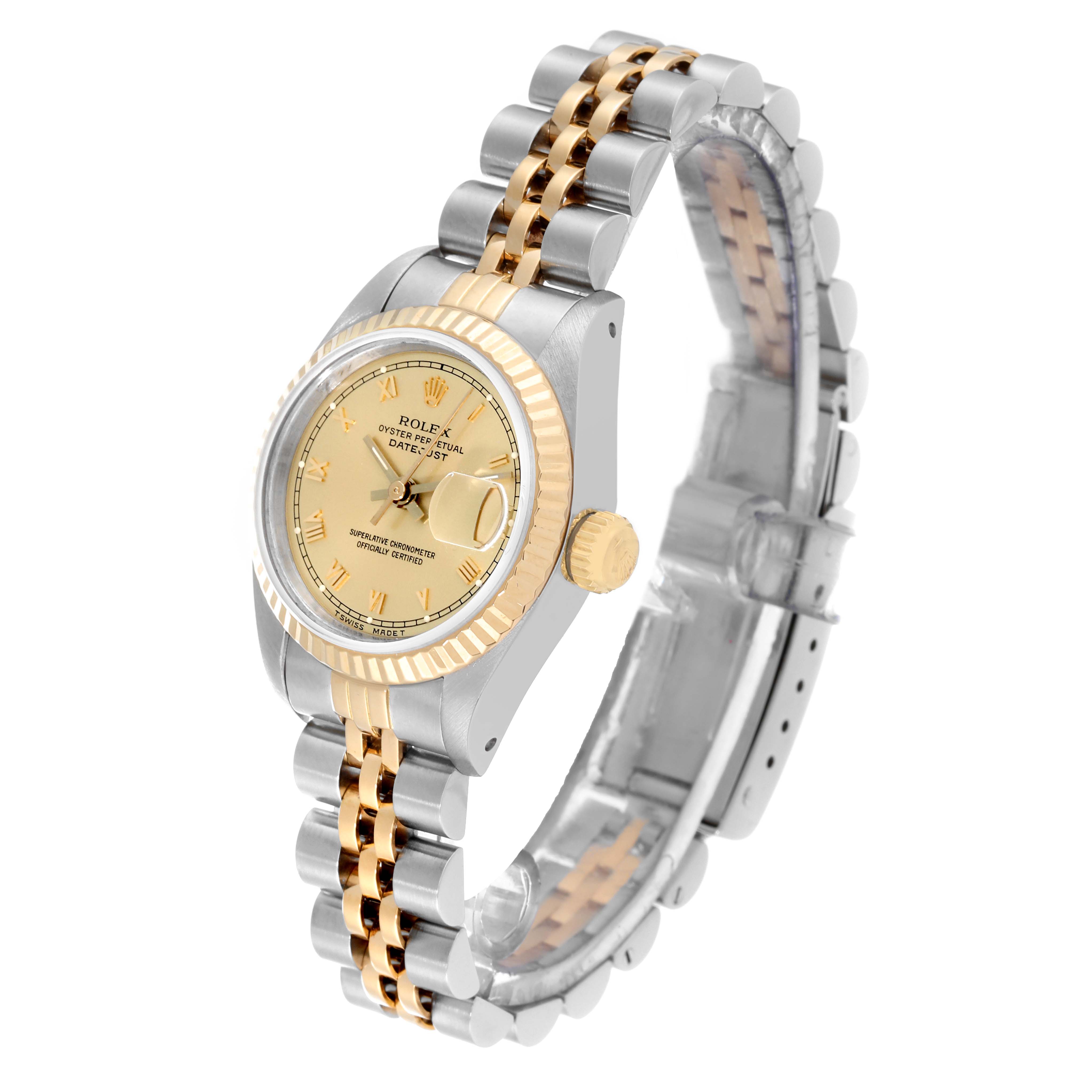 This image shows a side angle of a Rolex Datejust 69173 Women's Steel and Gold (two tone) Champagne Dial 69173 Women's Steel and Gold (two tone) Champagne Dial watch, featuring its dial, bezel, crown, and two-tone bracelet.