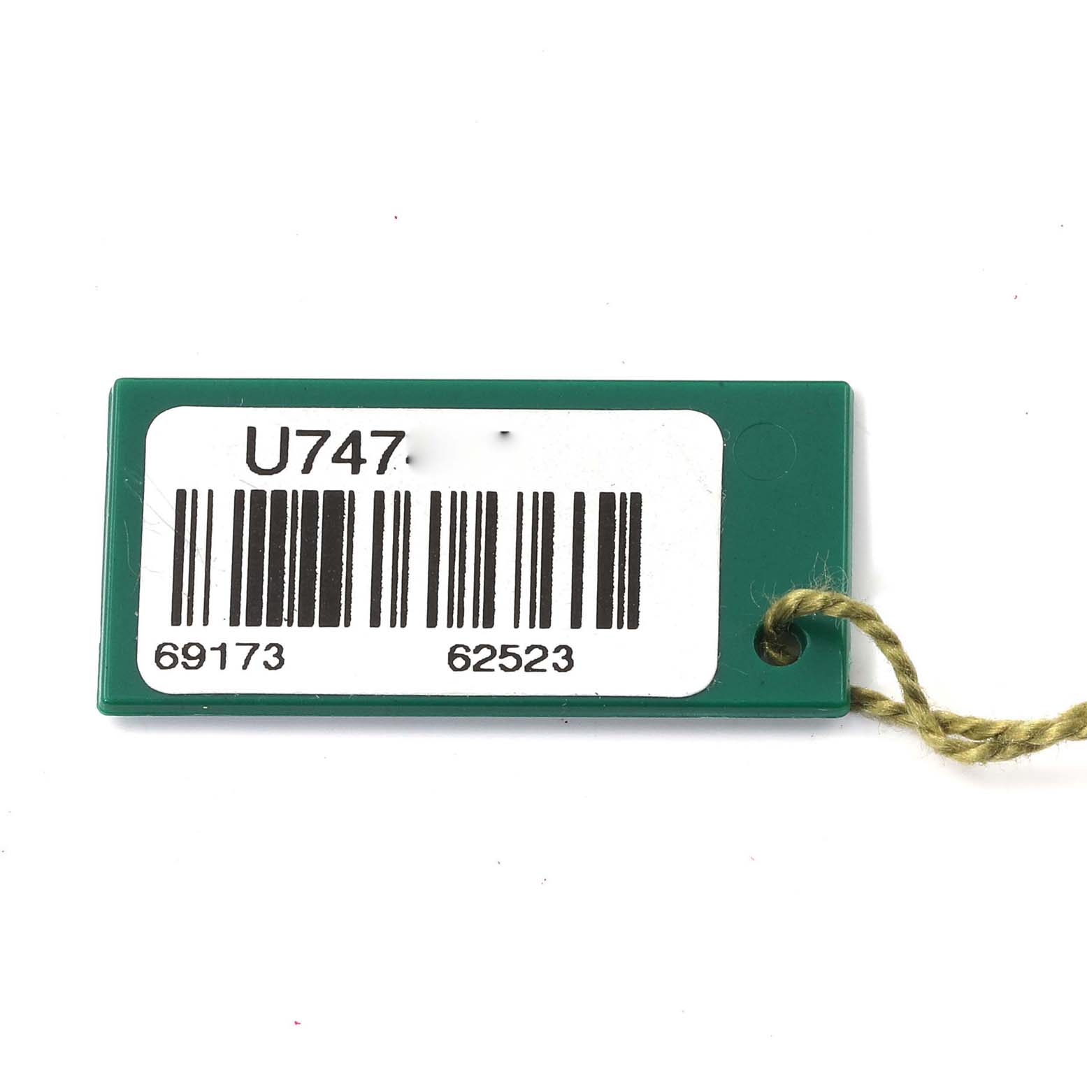 The image shows a green tag with barcodes and numbers, likely an accessory for a Rolex Datejust 69173 Women
s Steel and Gold (two tone) Grey Dial 69173 Women
s Steel and Gold (two tone) Grey Dial model watch.