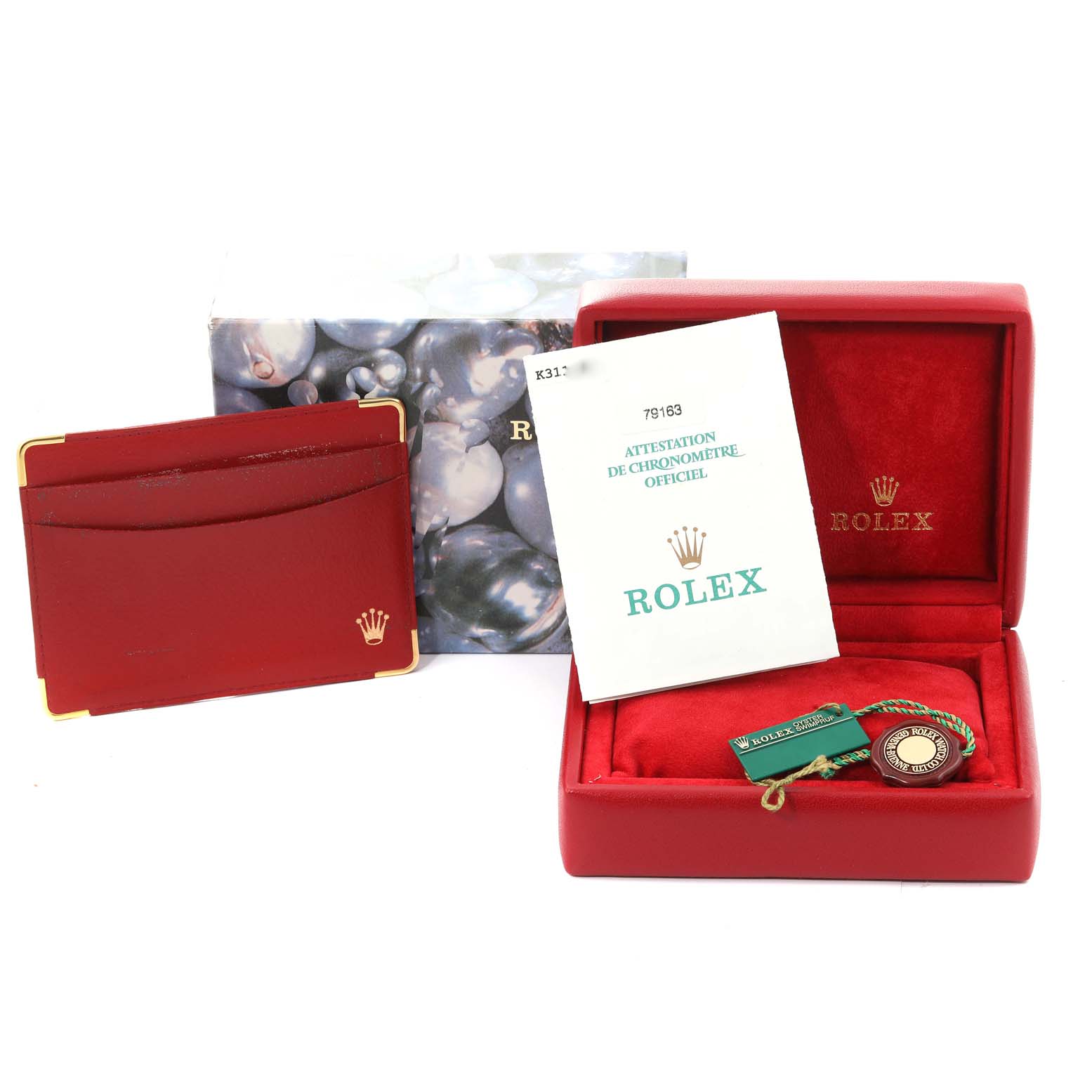 The image shows Rolex Datejust 79163 Women's Steel and Gold (two tone) Mother of Pearl Dial 79163 Women's Steel and Gold (two tone) Mother of Pearl Dial accessories including the box, a cardholder, a tag, and official certification.