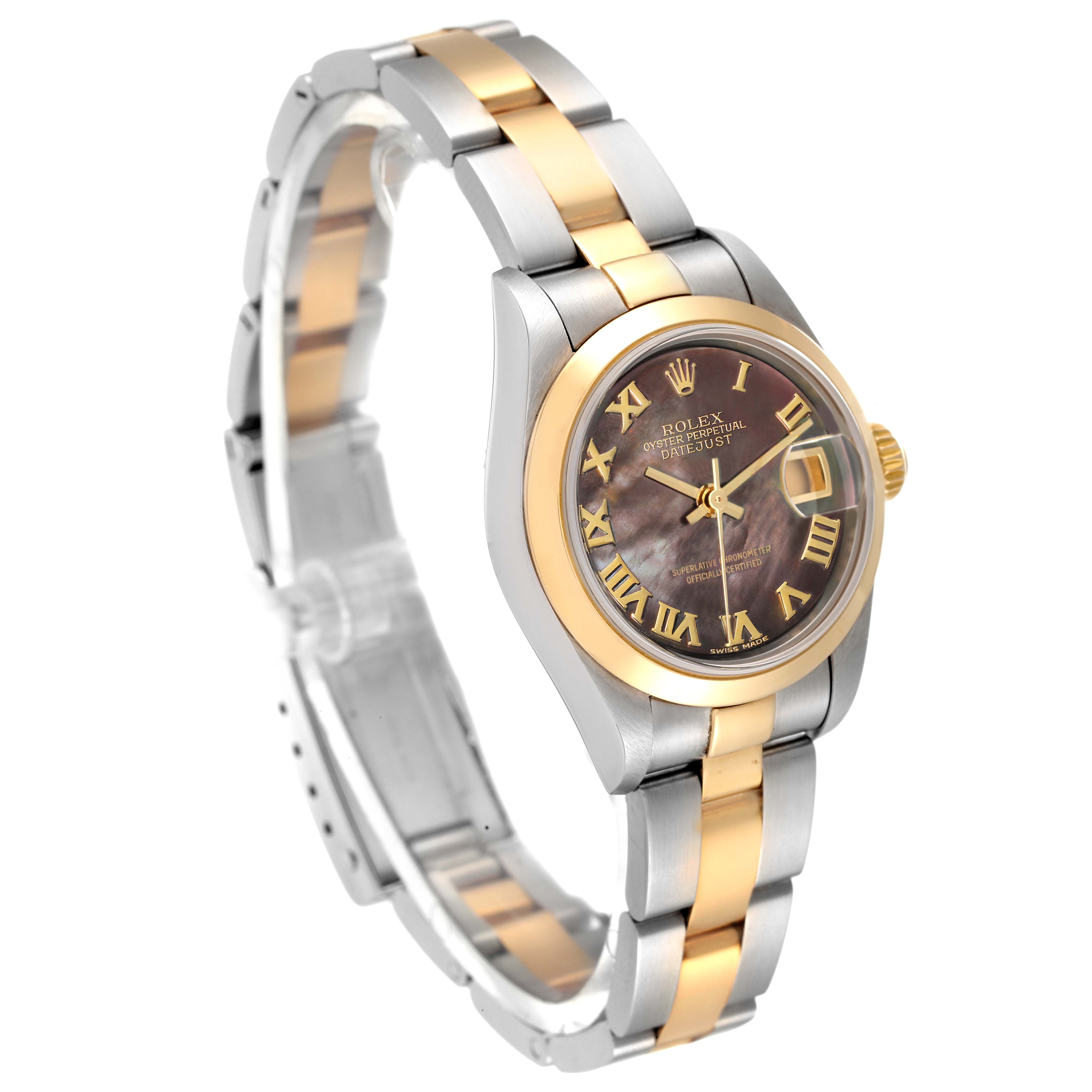 This image shows a Rolex Datejust 79163 Women's Steel and Gold (two tone) Mother of Pearl Dial 79163 Women's Steel and Gold (two tone) Mother of Pearl Dial watch with a gold bezel, two-tone bracelet, and a dark dial, captured at a three-quarter angle.