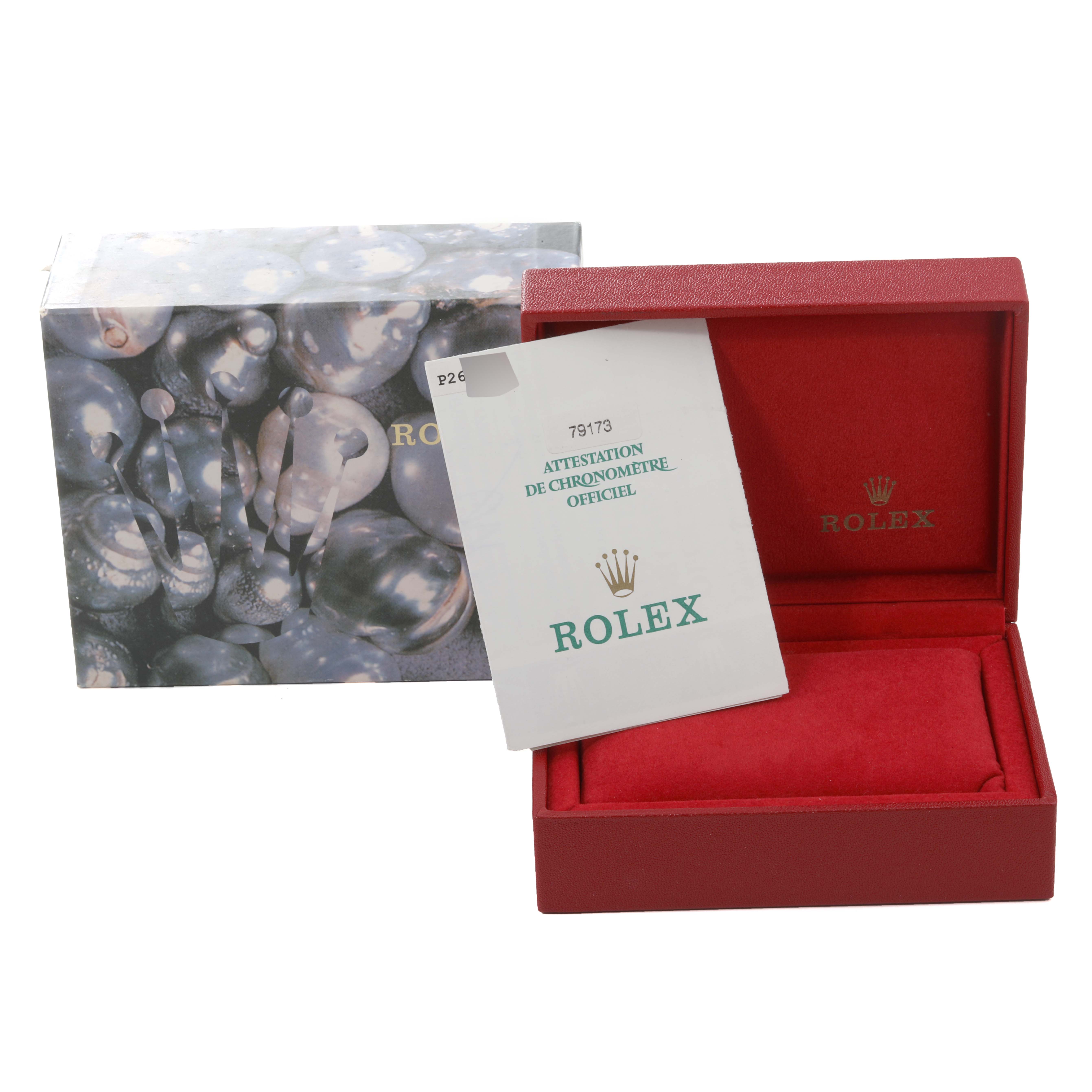 The image shows the packaging of a Rolex Datejust 79173 Women's Steel and Gold (two tone) Silver Dial 79173 Women's Steel and Gold (two tone) Silver Dial, including a decorative box, red watch box, and official documentation.