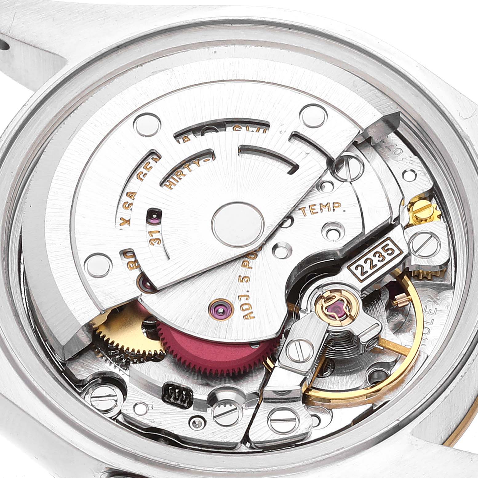 This image shows the movement and internal mechanism of a Rolex Datejust 79173 Women's Steel and Gold (two tone) White Dial 79173 Women's Steel and Gold (two tone) White Dial watch from a back angle.