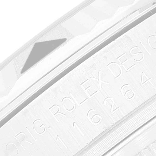 This close-up image shows the engraved bezel and part of the case of a Rolex Turn-o-Graph 116264 Men
s Stainless Steel Black Dial 116264 Men
s Stainless Steel Black Dial watch.