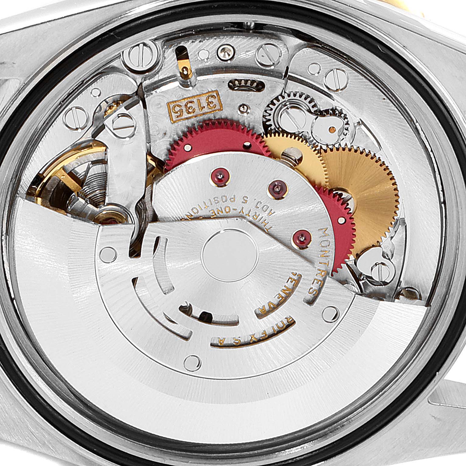 This image shows the internal mechanics and movement of a Rolex Turn-o-Graph 16263 Men
s Steel and Gold (two tone) White Dial 16263 Men
s Steel and Gold (two tone) White Dial watch from a close-up angle.