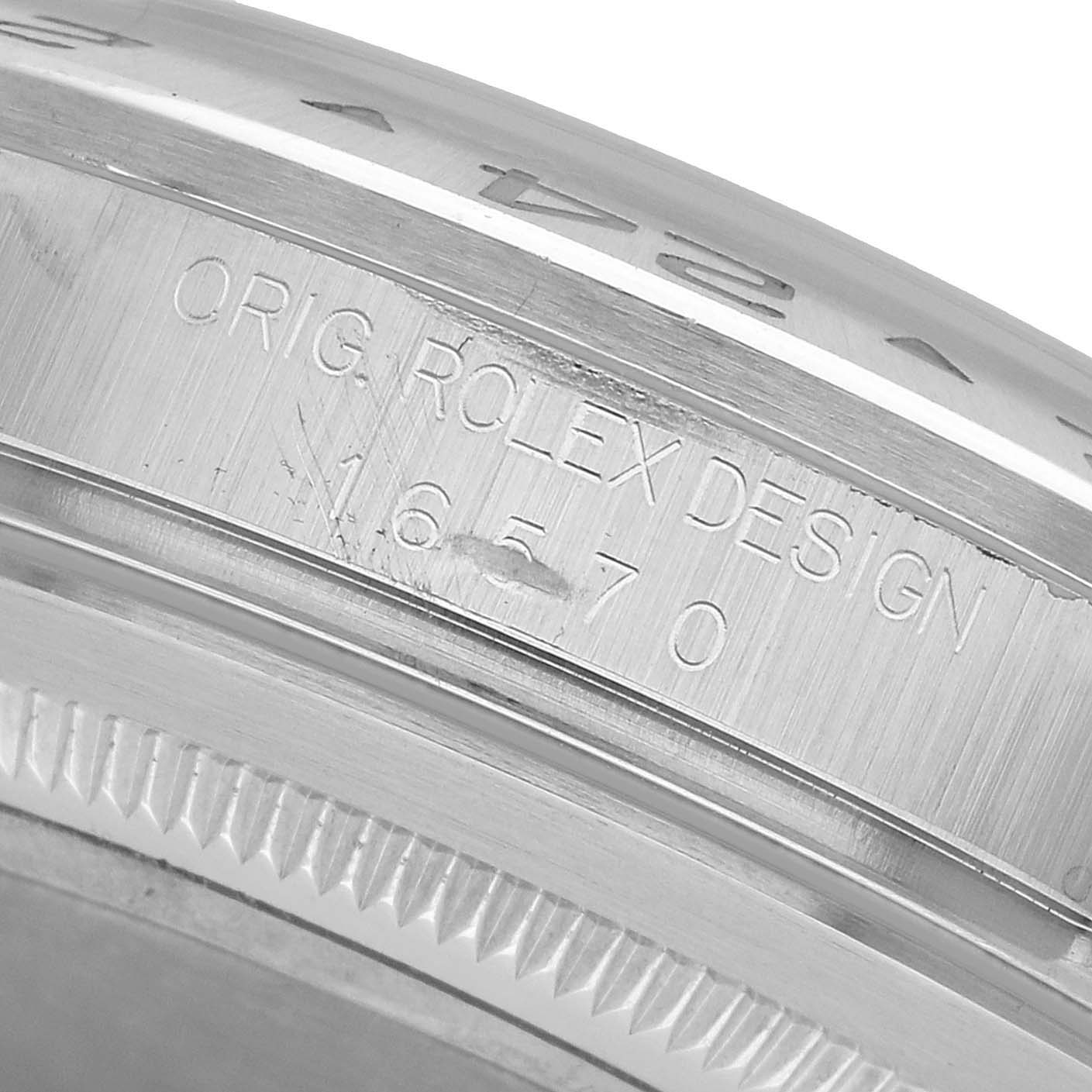 The image shows a close-up of the case side of a Rolex Explorer 16570 Men's Stainless Steel Black Dial, highlighting the engraved model number.