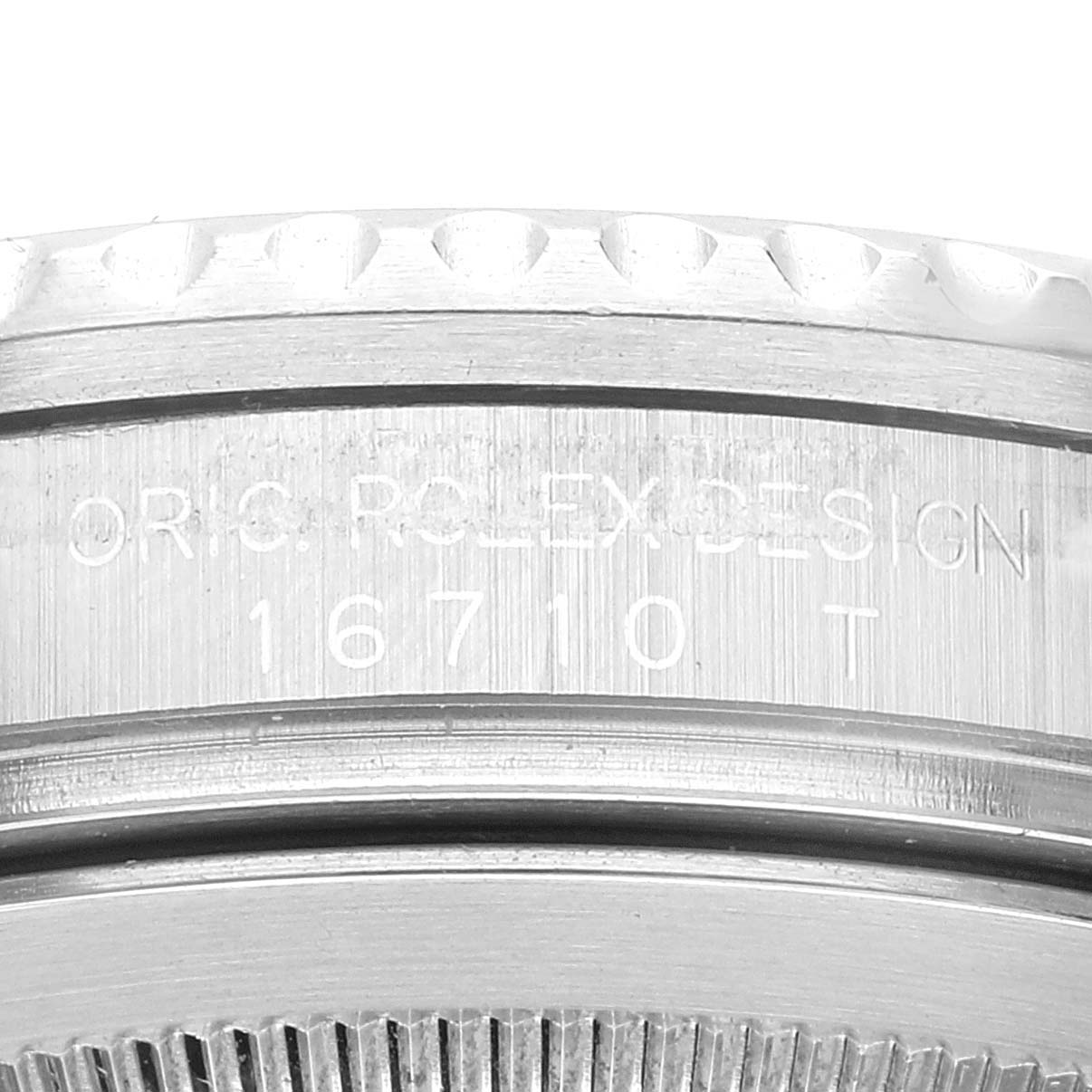 This close-up image shows the side of the case with the engraved model number 16710T of a Rolex GMT-Master 16710 Men's Stainless Steel Black Dial 16710 Men's Stainless Steel Black Dial watch.