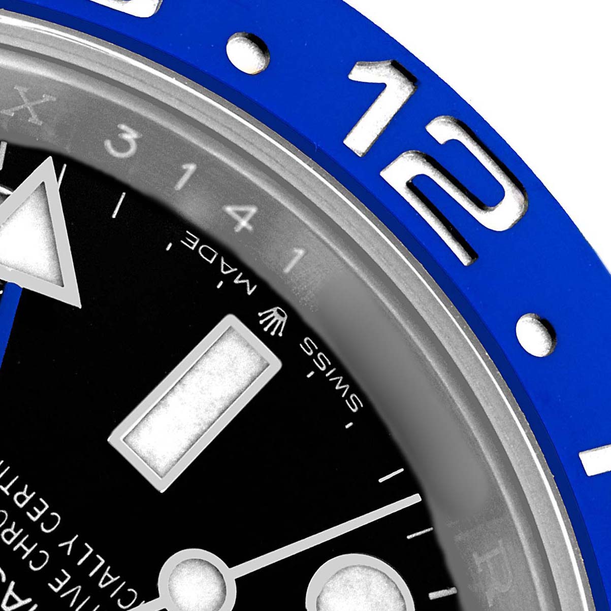 The image shows a close-up of the Rolex GMT-Master 126710BLNR Men's Stainless Steel Black Dial's dial and blue bezel, highlighting the 12-hour marker and hands.