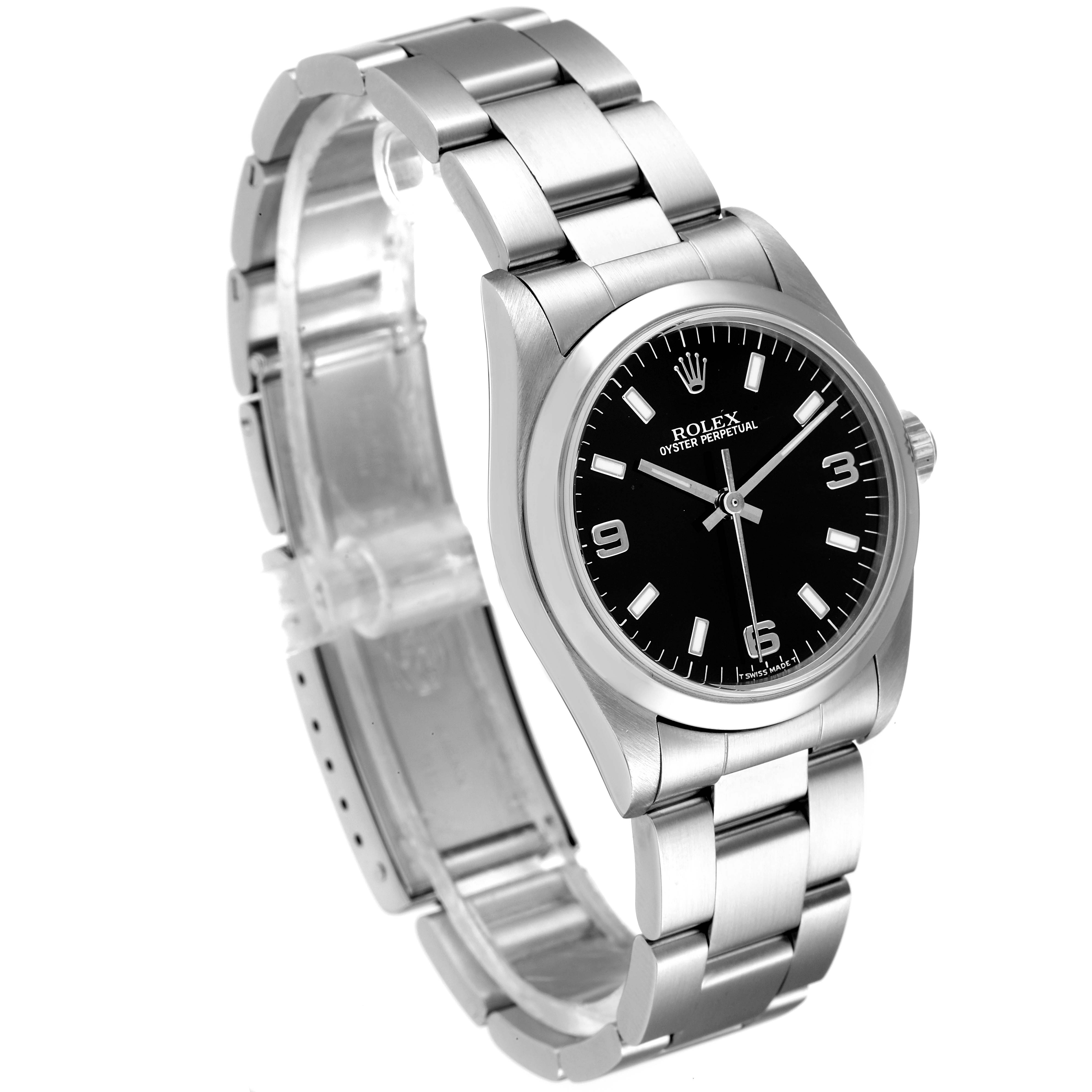 The Rolex Mid-Size 67480 Women's Stainless Steel Black Dial 67480 Women's Stainless Steel Black Dial watch is shown at a slight angle, displaying its black dial, bezel, and stainless steel bracelet.