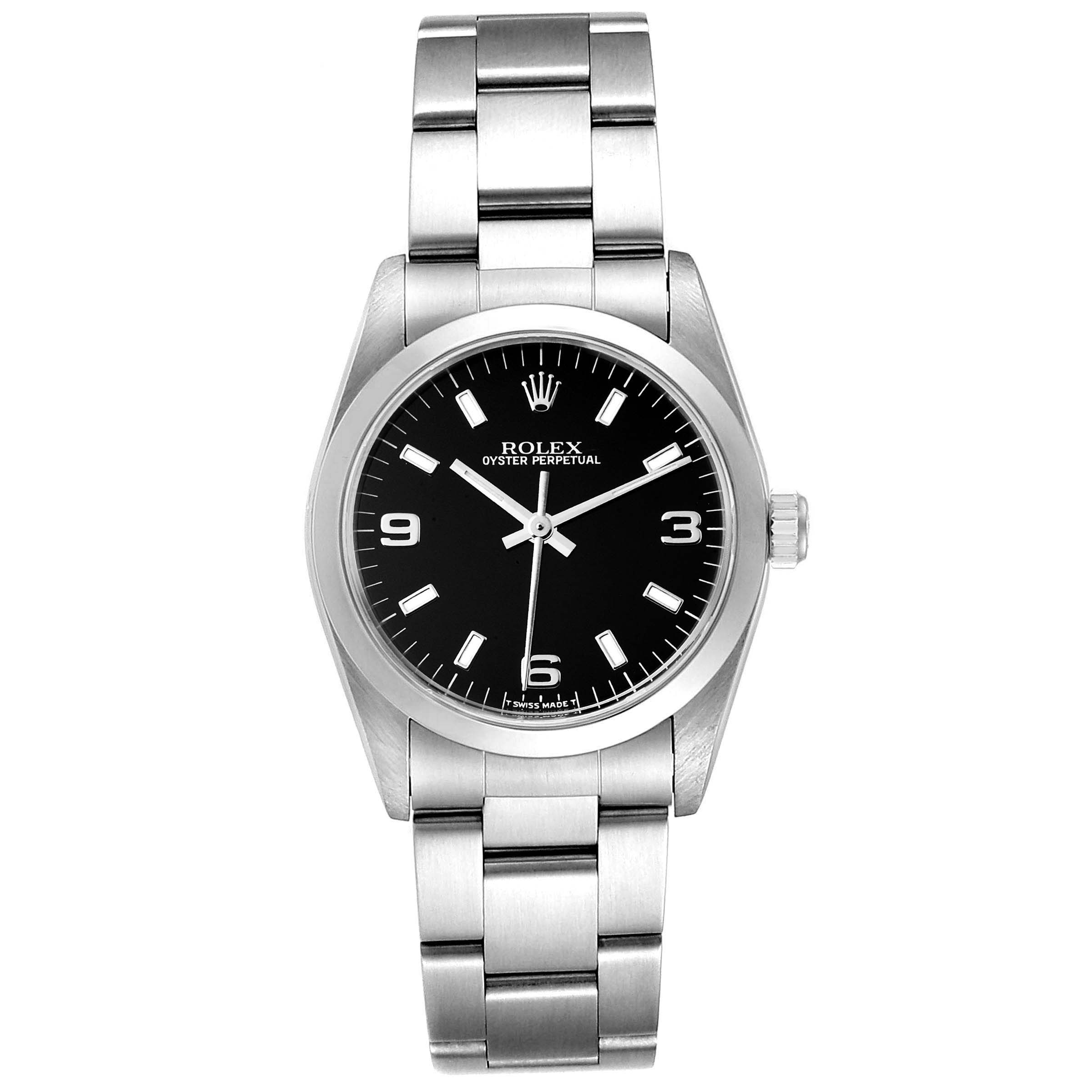 The image shows a front view of a Rolex Mid-Size 67480 Women's Stainless Steel Black Dial 67480 Women's Stainless Steel Black Dial Oyster Perpetual watch, displaying its face and band.