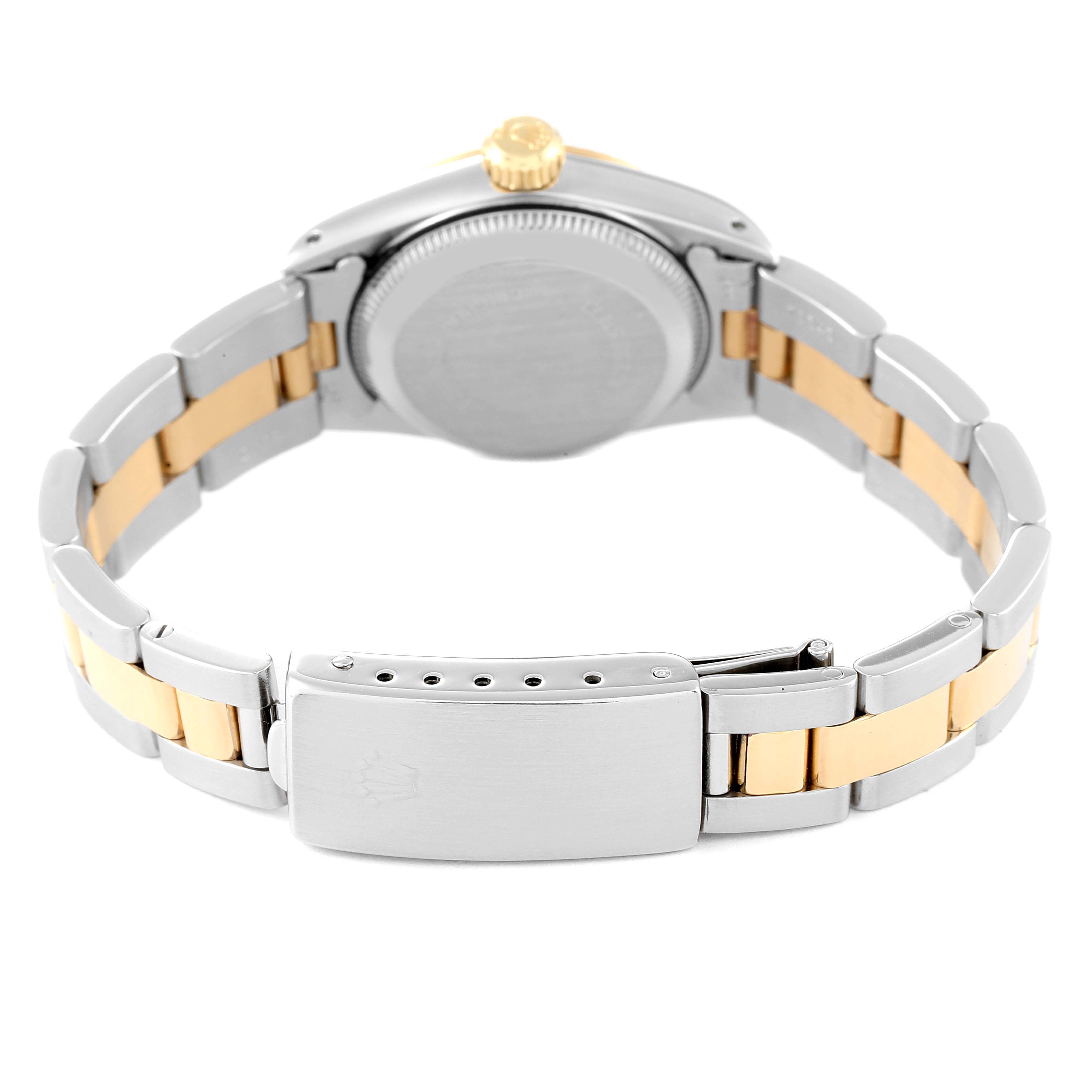 This image shows the back view of the Rolex Oyster Perpetual 67193 Women's Steel and Gold (two tone) Champagne Dial 67193 Women's Steel and Gold (two tone) Champagne Dial watch, highlighting the clasp and bracelet.