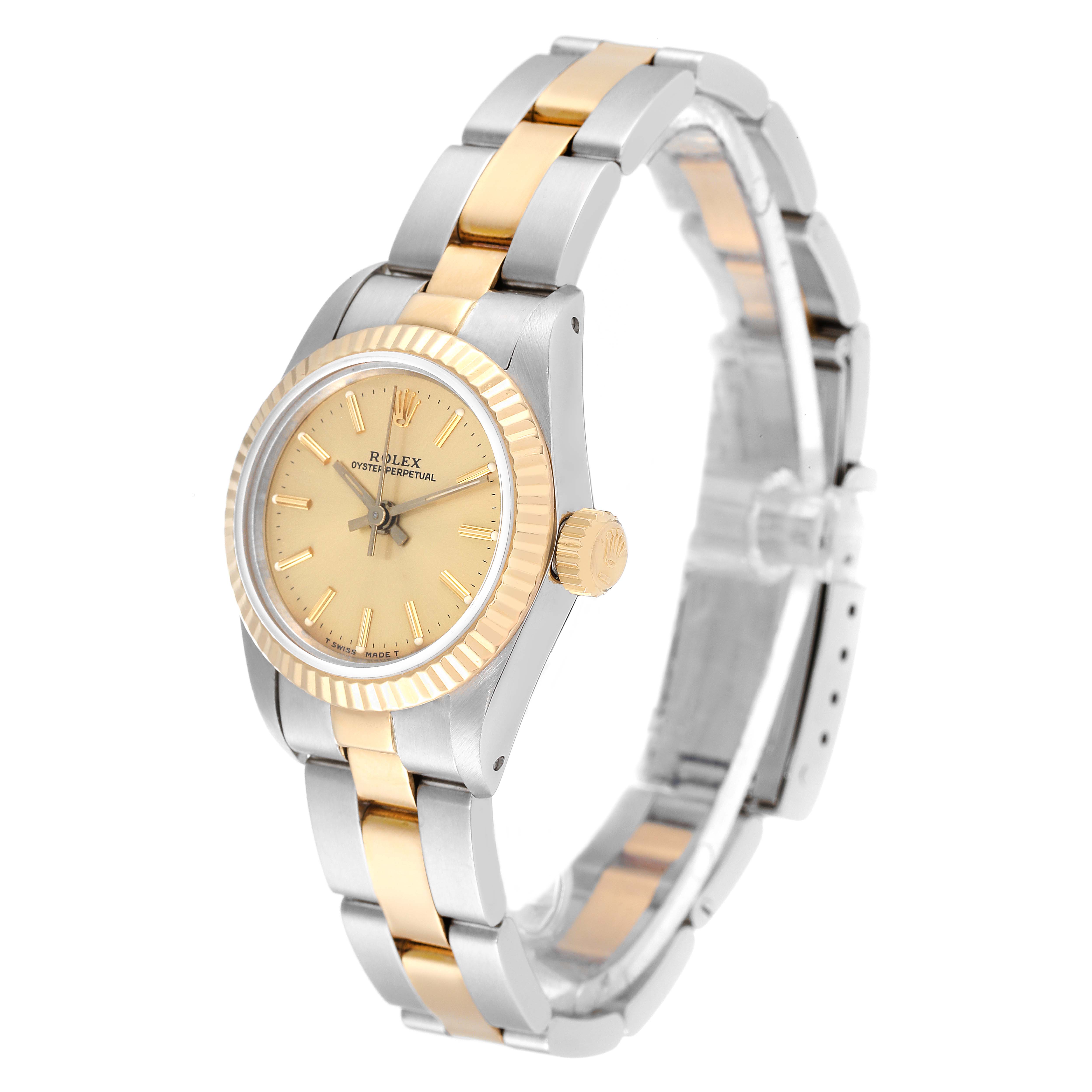 The image shows a side angle view of a Rolex Oyster Perpetual 67193 Women's Steel and Gold (two tone) Champagne Dial 67193 Women's Steel and Gold (two tone) Champagne Dial watch, displaying the face, bezel, and two-tone metal bracelet.