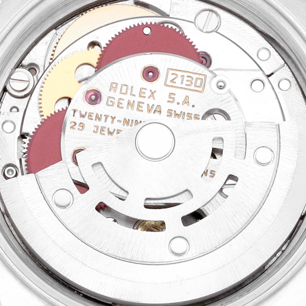 This is a close-up view of the movement mechanism inside the Rolex Oyster Perpetual 67193 Women's Steel and Gold (two tone) Champagne Dial 67193 Women's Steel and Gold (two tone) Champagne Dial model watch.