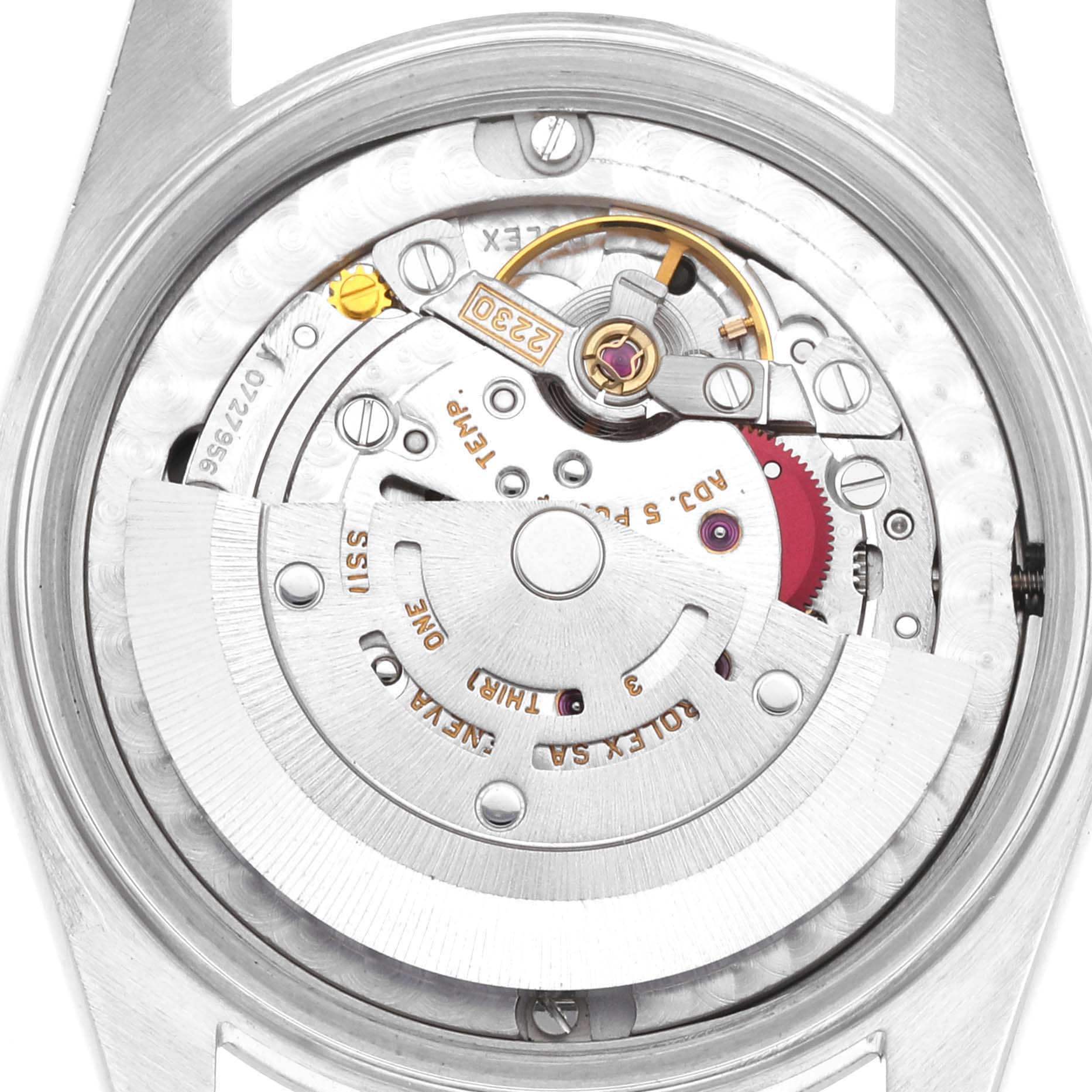 The image shows the intricate movement mechanism of a Rolex Oyster Perpetual 77080 Women's Stainless Steel Black Dial watch from a back view angle.