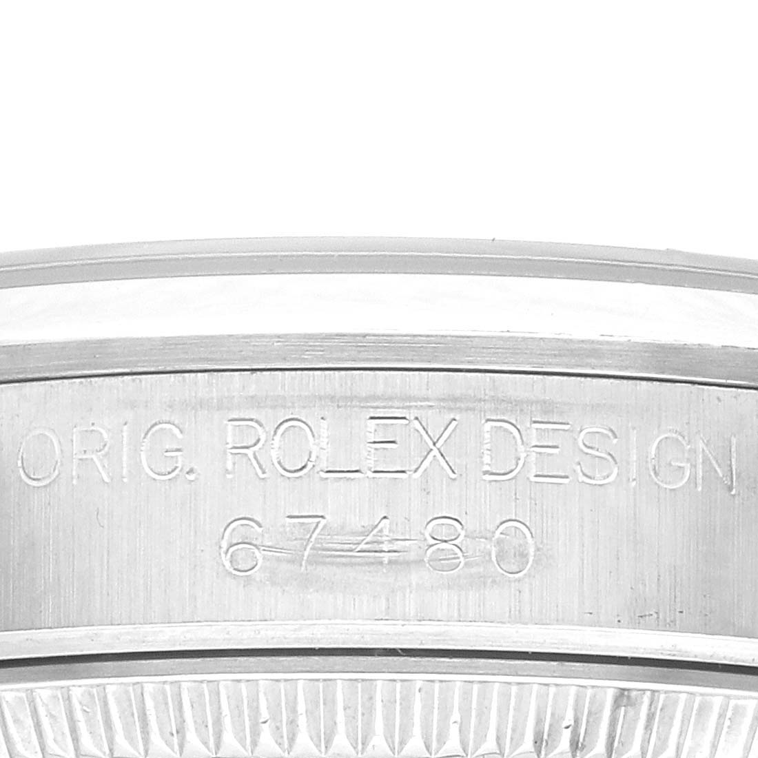 The image shows the case side of a Rolex Mid-Size 67480 Women's Stainless Steel Pink Dial model, displaying the engraving "ORIG. ROLEX DESIGN 67480."